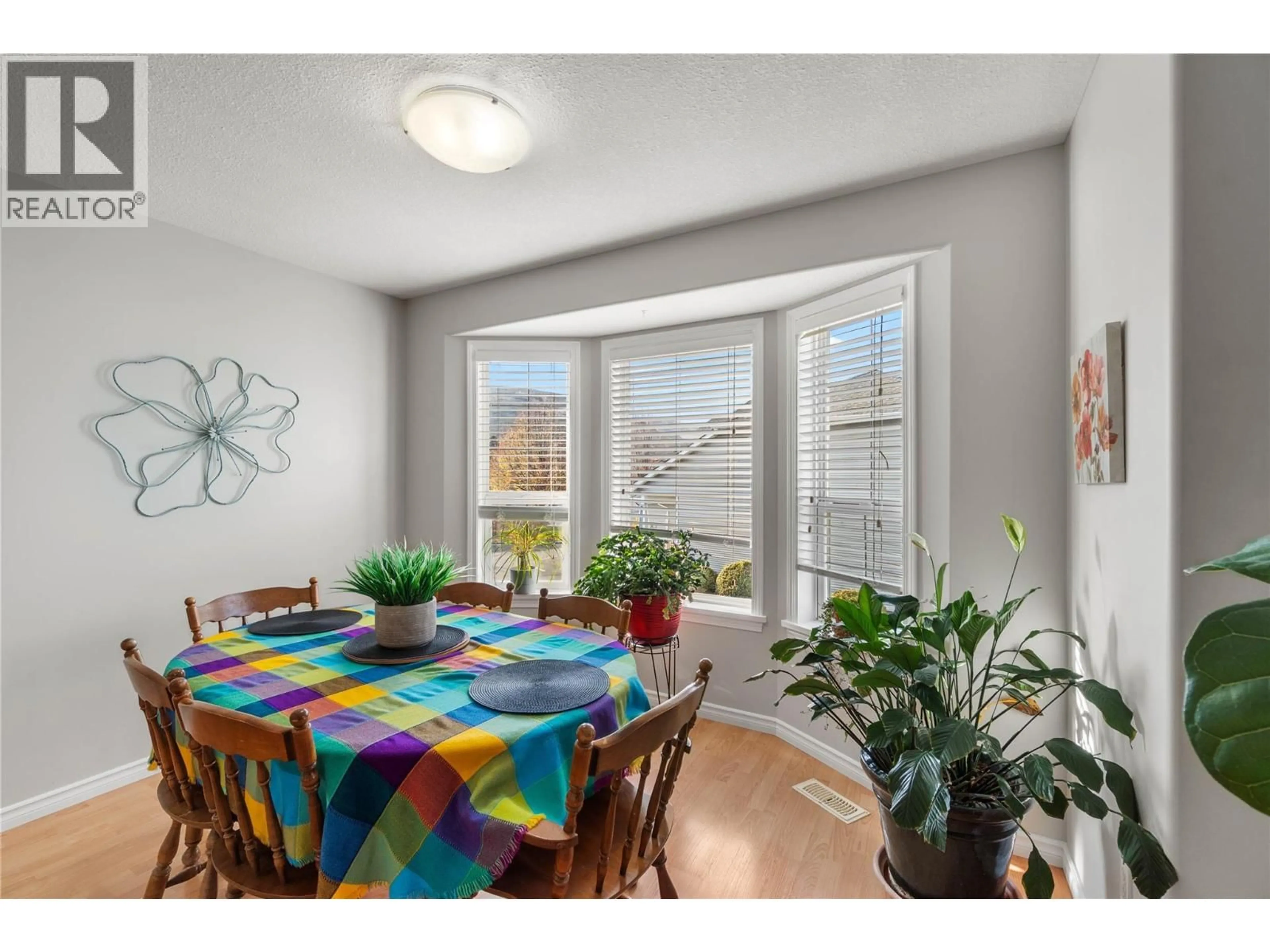 Dining room, wood/laminate floor for 27 - 1104 QUAIL DRIVE, Kamloops British Columbia V2B8S6