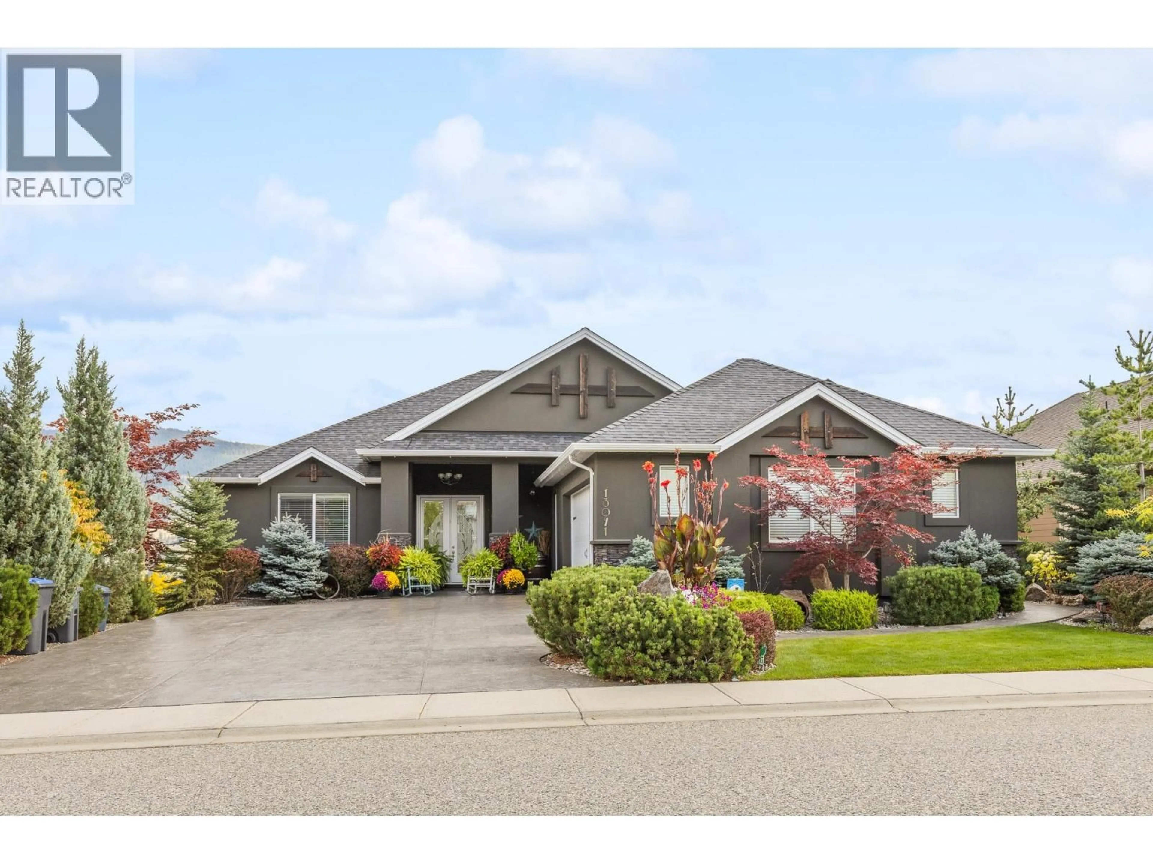 Home with vinyl exterior material, street for 13071 EAST RIDGE DRIVE, Lake Country British Columbia V4V2P9