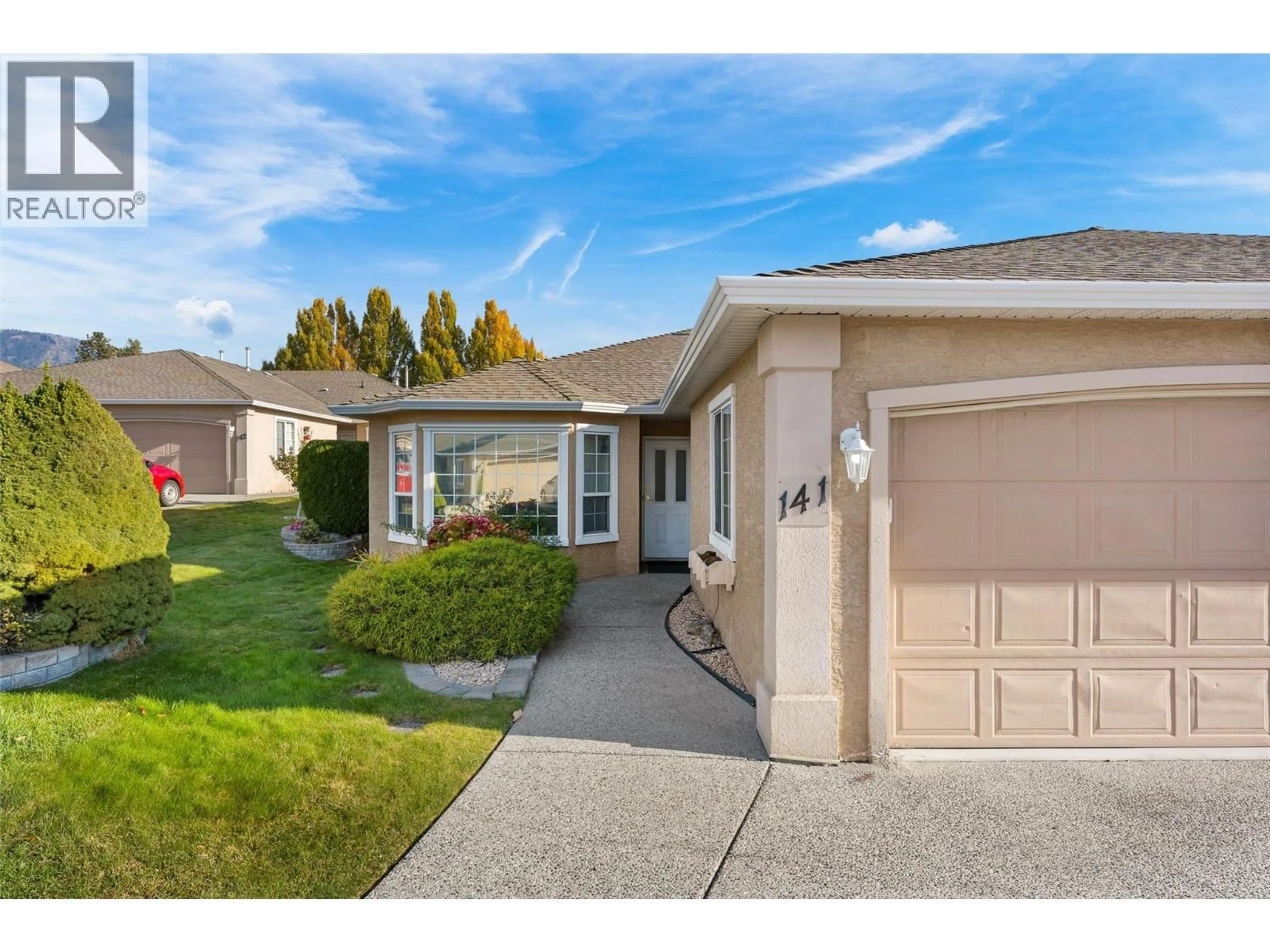 Home with vinyl exterior material, street for 141 - 2250 LOUIE DRIVE, West Kelowna British Columbia V4T2M6