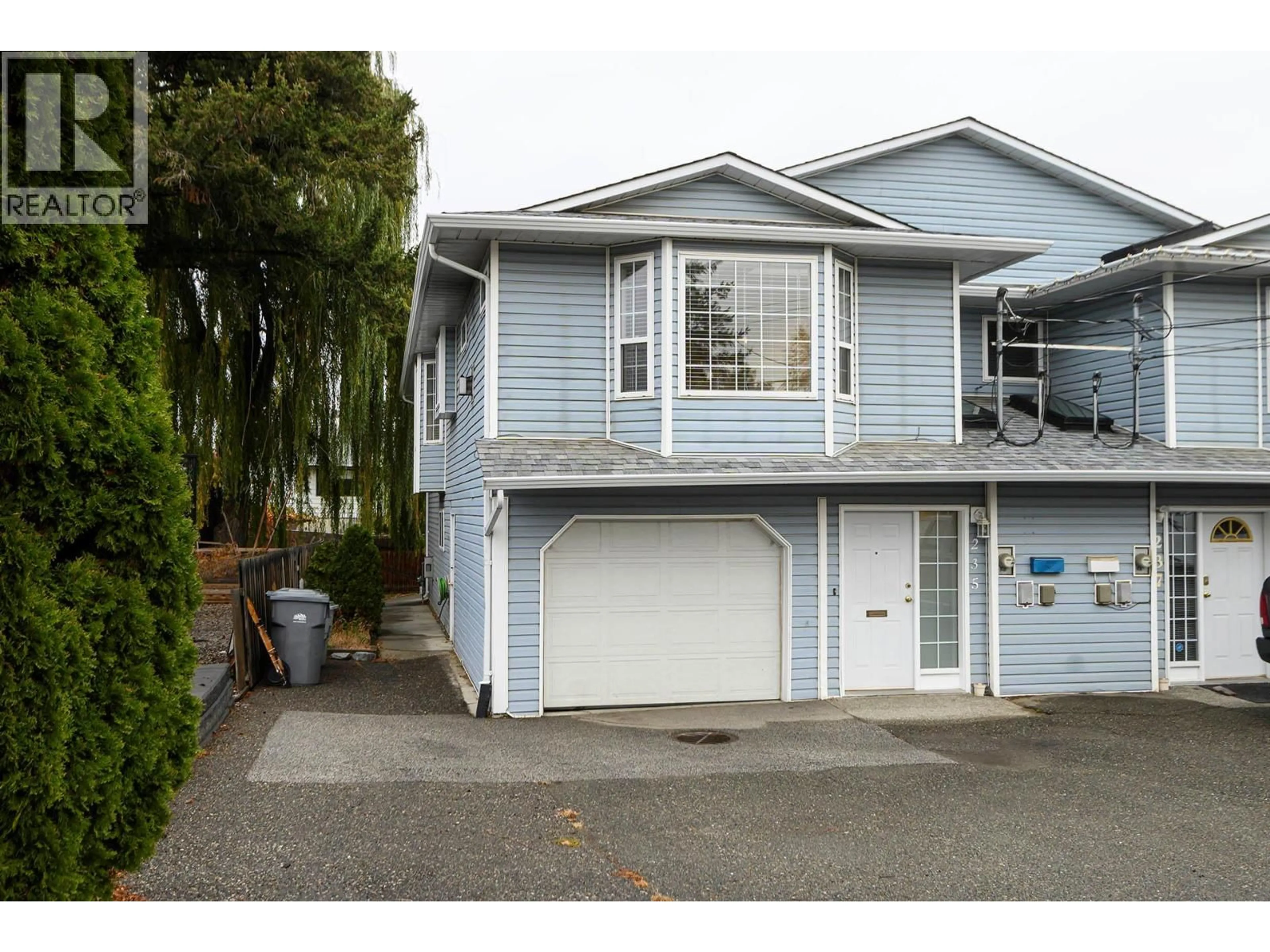 Home with vinyl exterior material, street for 235 JUNIPER AVENUE, Kamloops British Columbia V2B1H8
