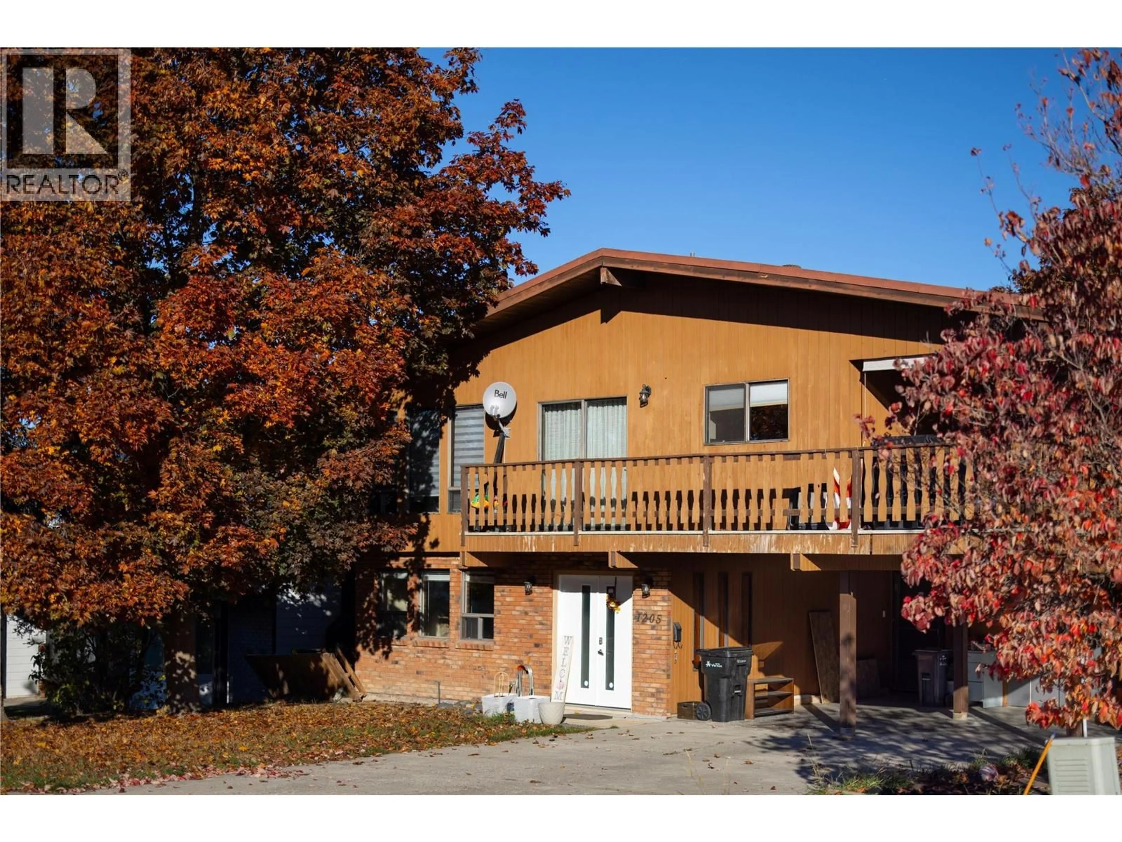 Home with brick exterior material, building for 1205 41 AVENUE, Vernon British Columbia V1T8A6