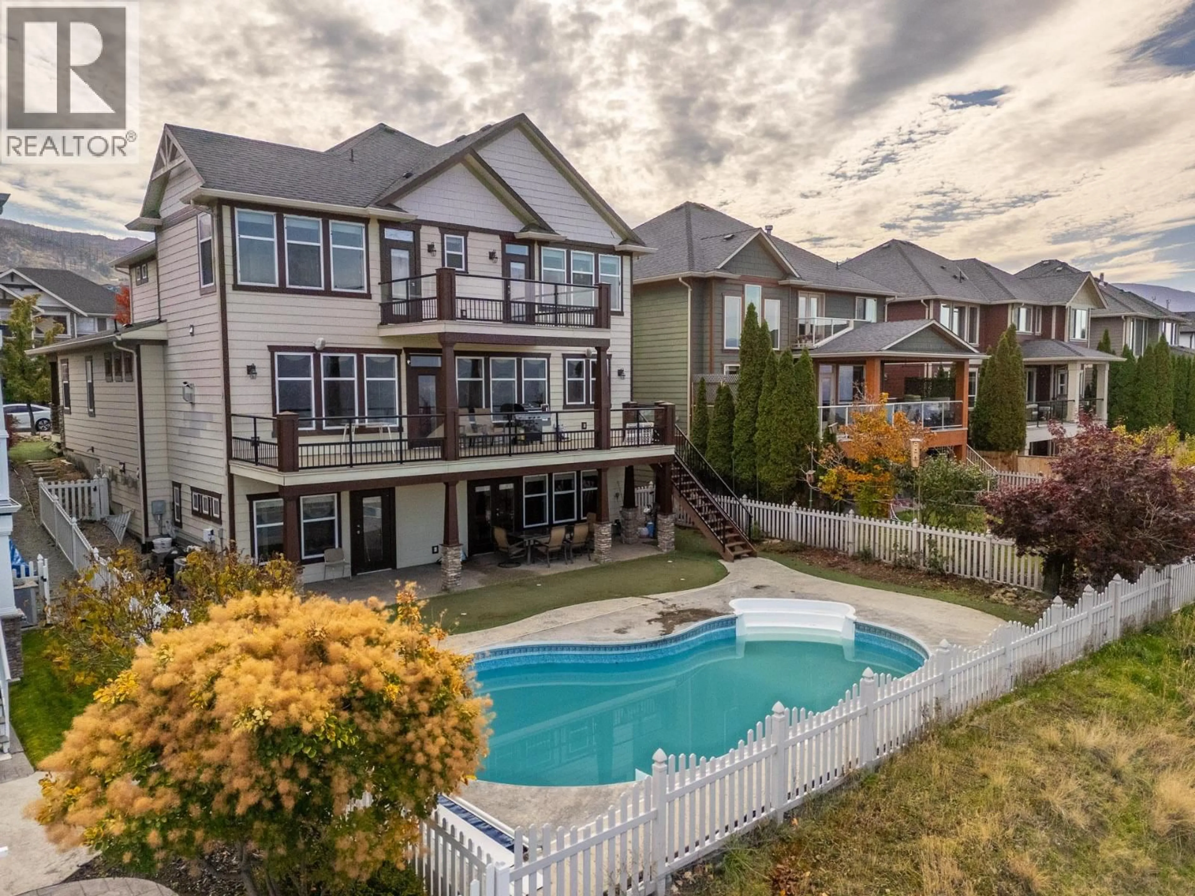 A pic from outside/outdoor area/front of a property/back of a property/a pic from drone, water/lake/river/ocean view for 5344 PTARMIGAN STREET, Kelowna British Columbia V1W5A4