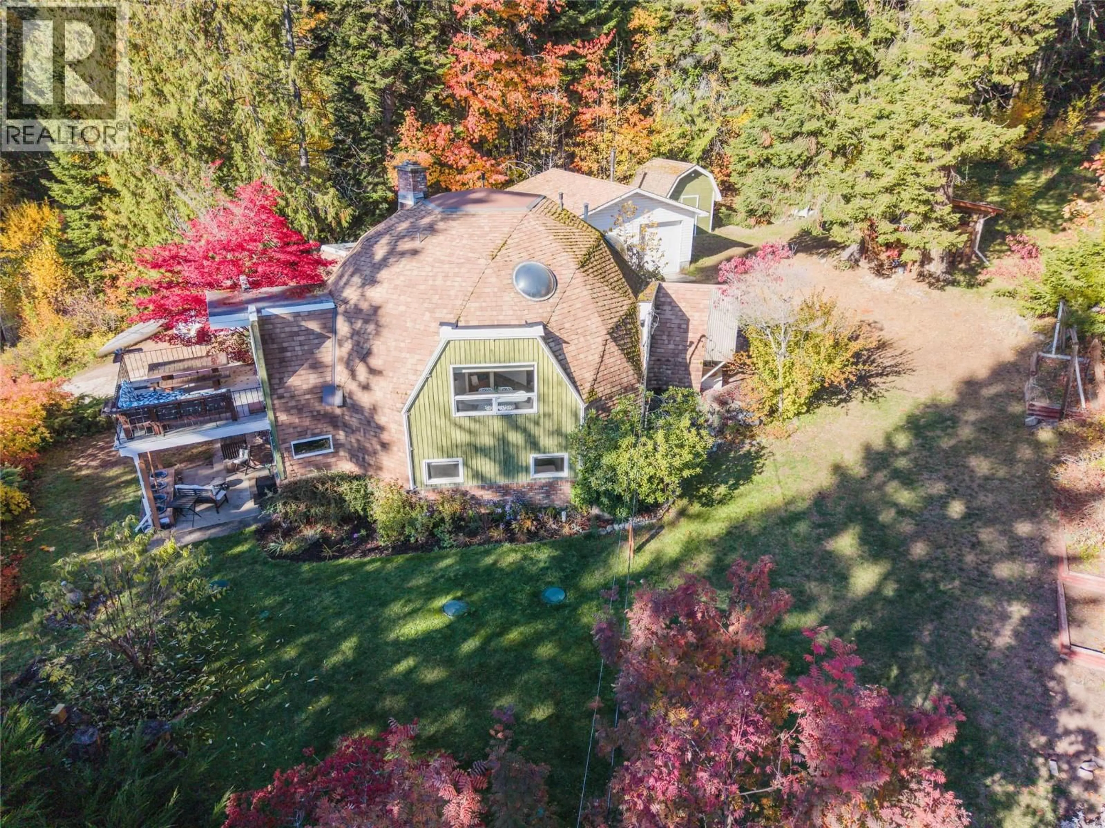 A pic from outside/outdoor area/front of a property/back of a property/a pic from drone, forest/trees view for 5657 LONGBEACH ROAD, Nelson British Columbia V1L6N9