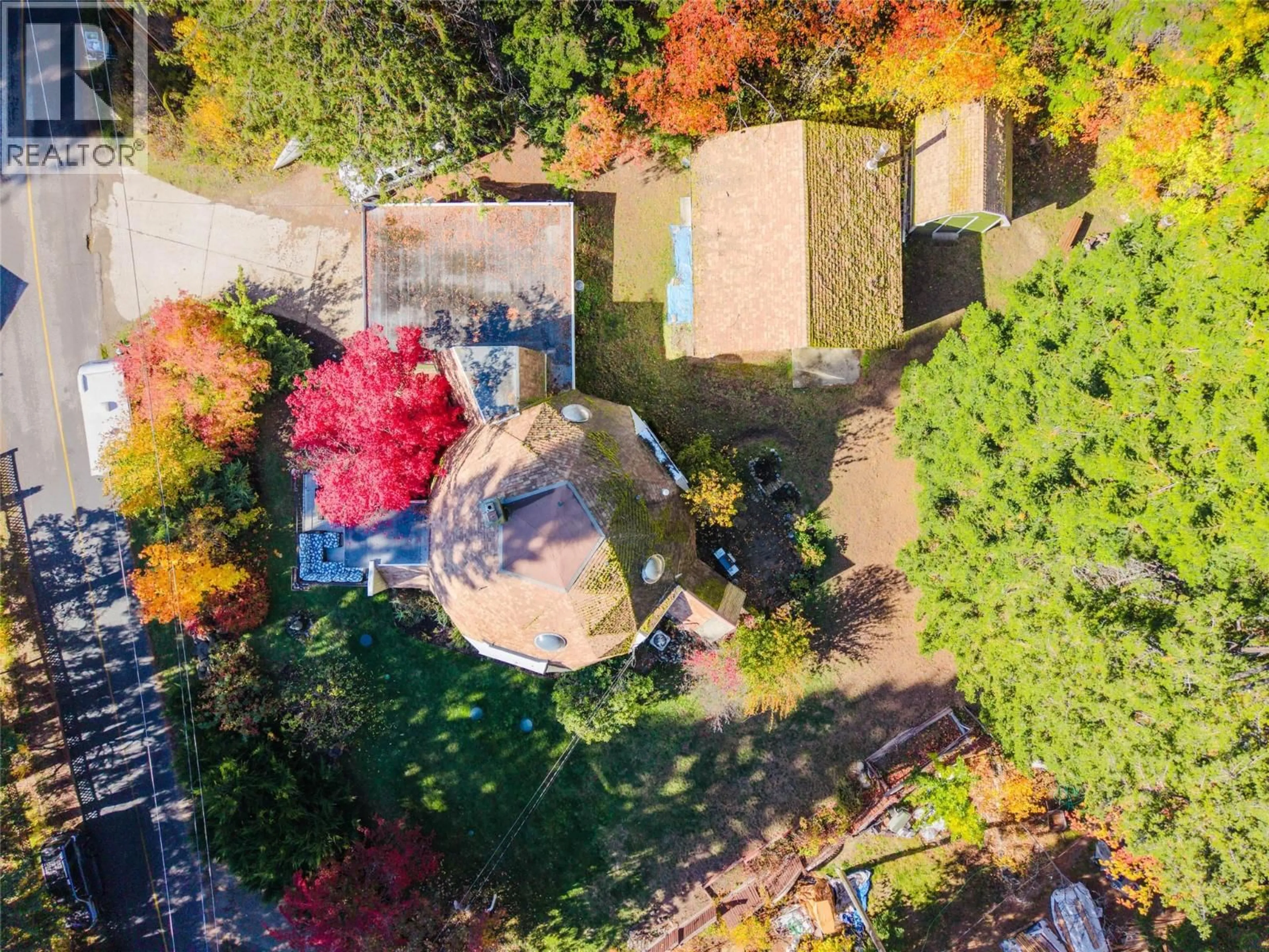 A pic from outside/outdoor area/front of a property/back of a property/a pic from drone, unknown for 5657 LONGBEACH ROAD, Nelson British Columbia V1L6N9