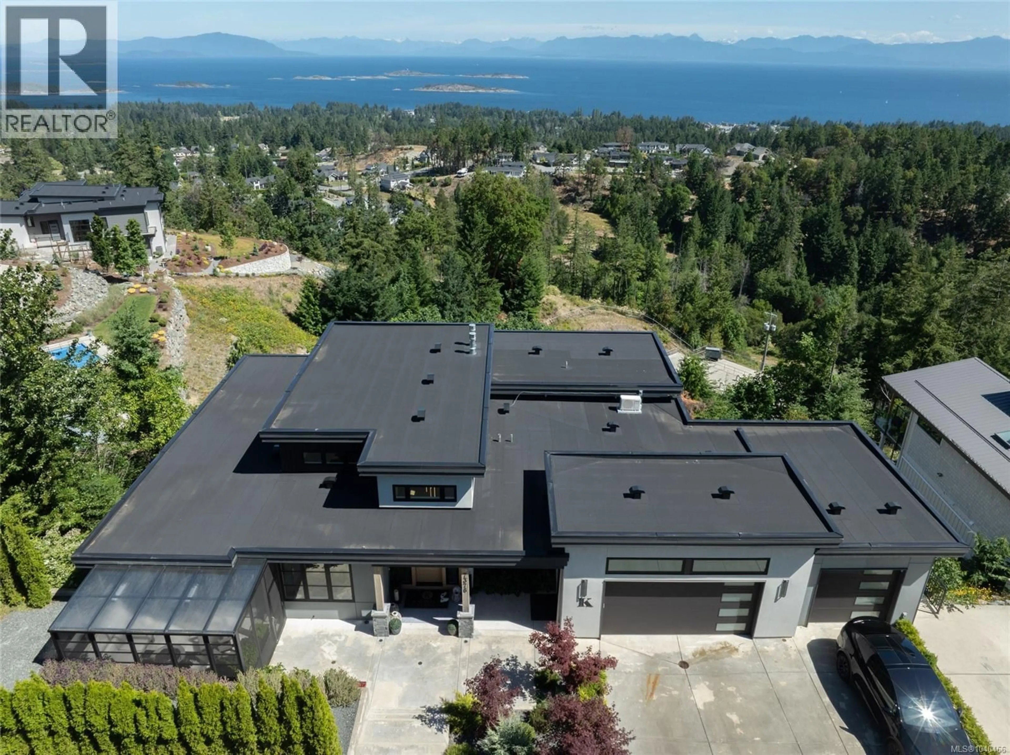 A pic from outside/outdoor area/front of a property/back of a property/a pic from drone, mountain view for 7376 HIGH RIDGE CRESCENT, Lantzville British Columbia V0R2H0