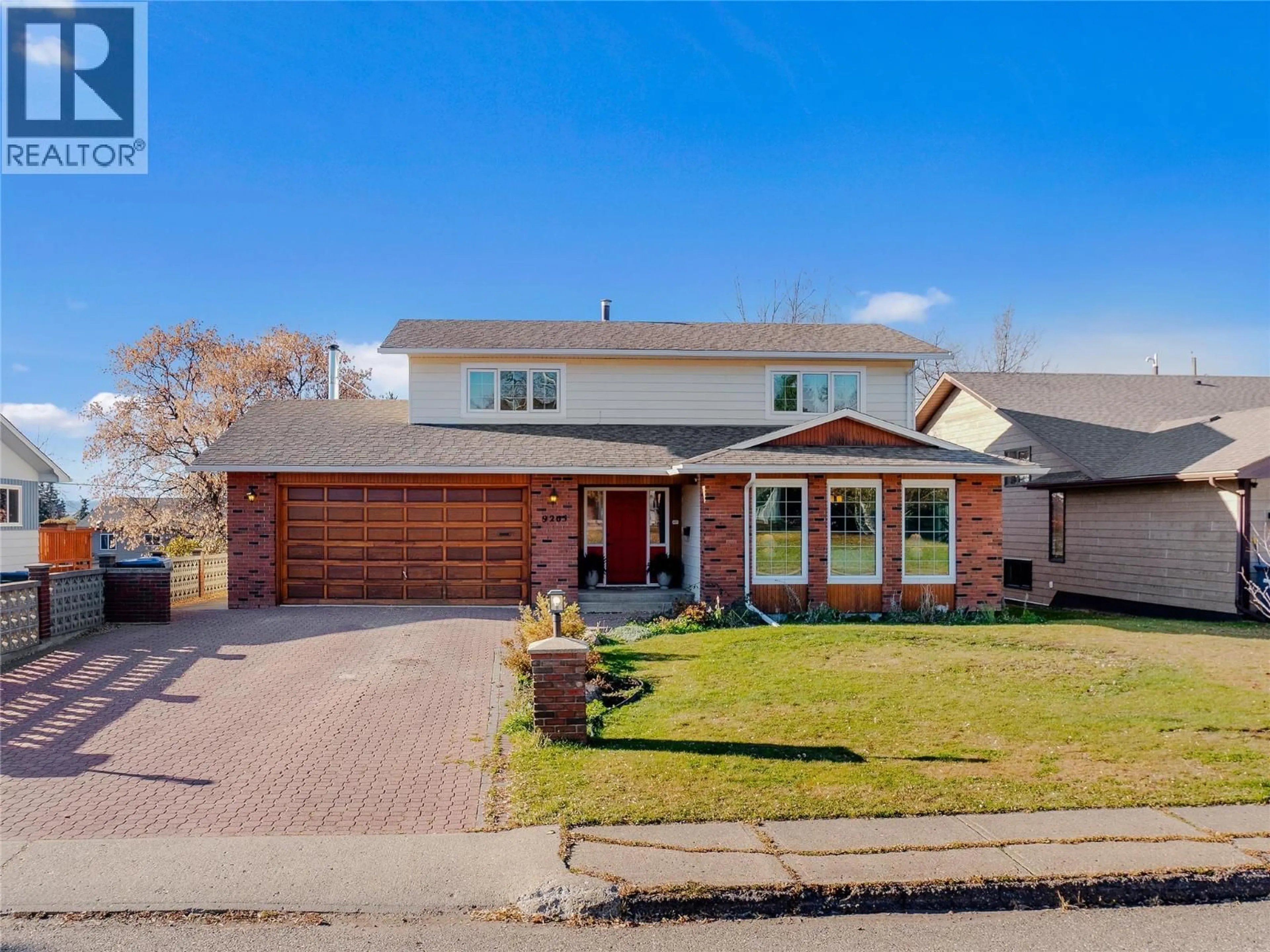 Home with brick exterior material, street for 9205 7 STREET, Dawson Creek British Columbia V1G3M4