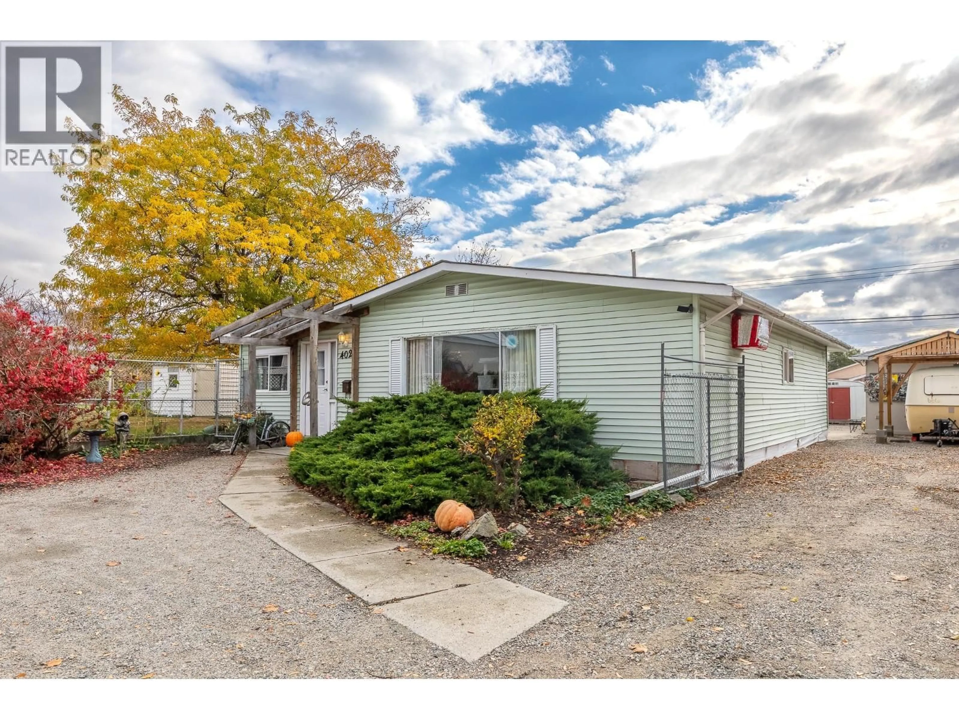 Home with vinyl exterior material, street for 402 CONKLIN AVENUE, Penticton British Columbia V2A2T4