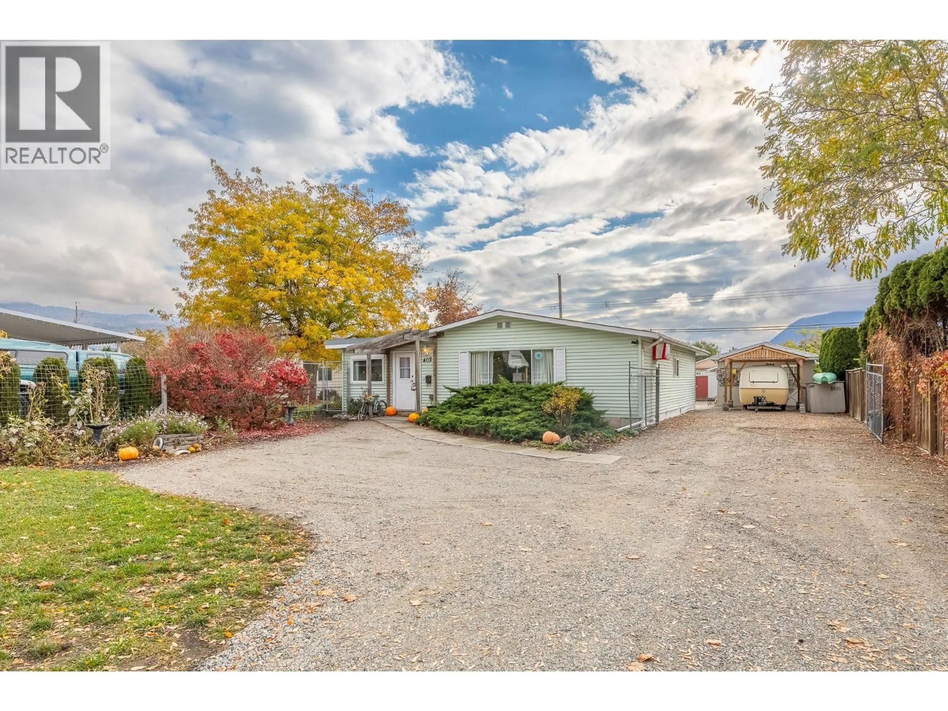 A pic from outside/outdoor area/front of a property/back of a property/a pic from drone, street for 402 CONKLIN AVENUE, Penticton British Columbia V2A2T4