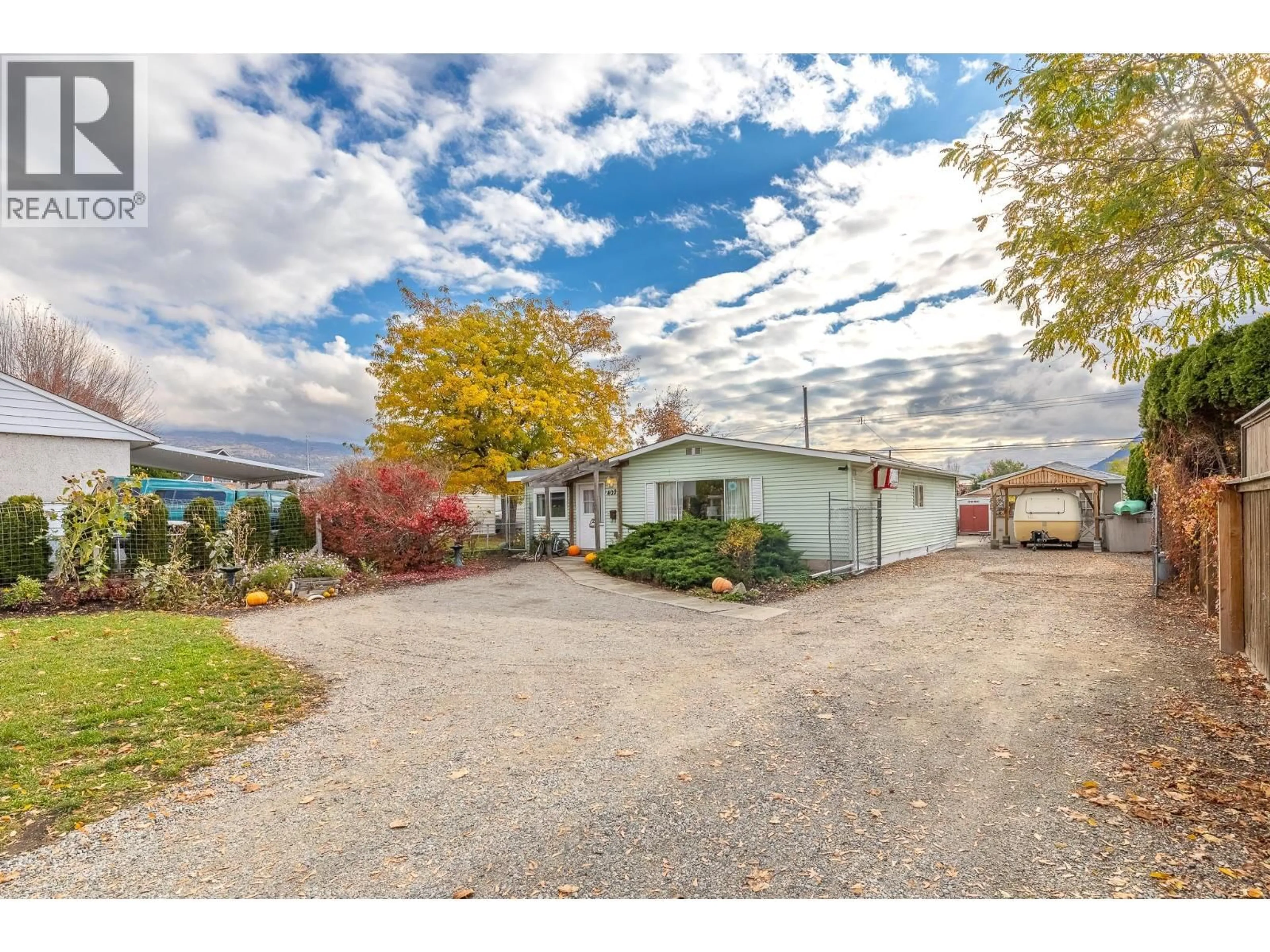 A pic from outside/outdoor area/front of a property/back of a property/a pic from drone, street for 402 CONKLIN AVENUE, Penticton British Columbia V2A2T4