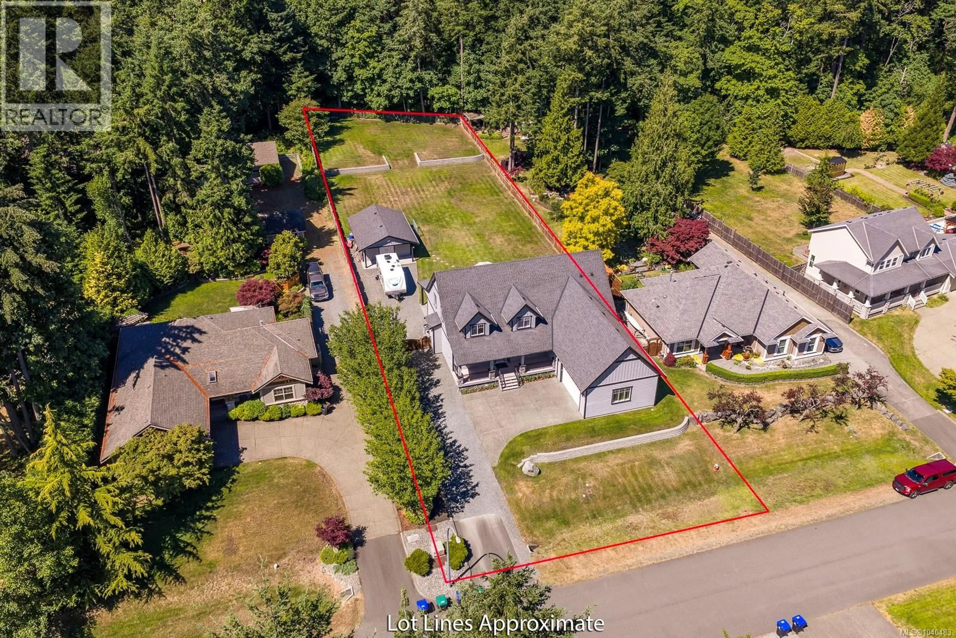 A pic from outside/outdoor area/front of a property/back of a property/a pic from drone, street for 614 COLBY ROAD, Comox British Columbia V9M4H8