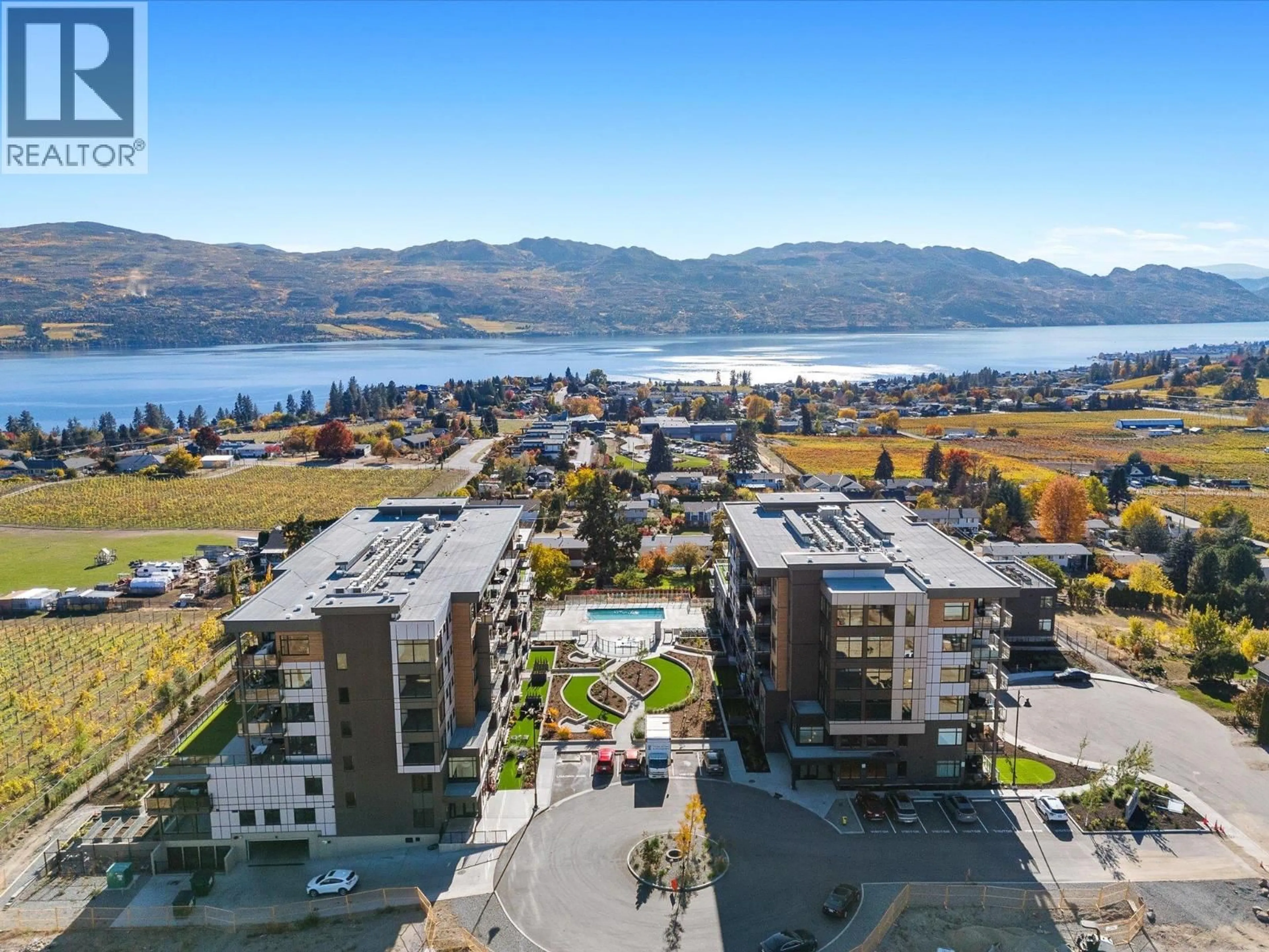 A pic from outside/outdoor area/front of a property/back of a property/a pic from drone, water/lake/river/ocean view for 604 - 2780 OLALLA ROAD, West Kelowna British Columbia V1Z2A9