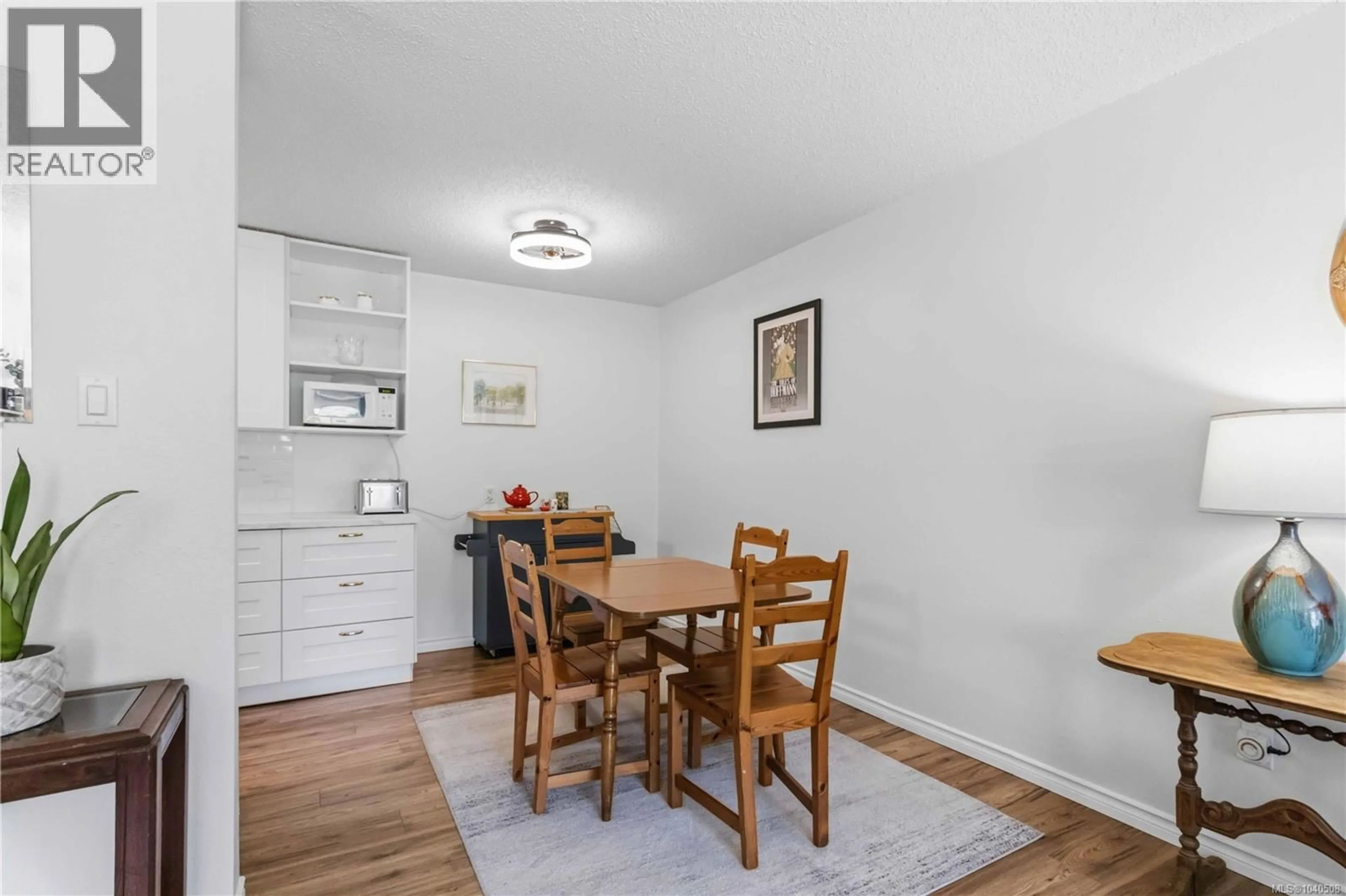 Dining room, wood/laminate floor for 220 - 3225 ELDON PLACE, Saanich British Columbia V8Z6A7