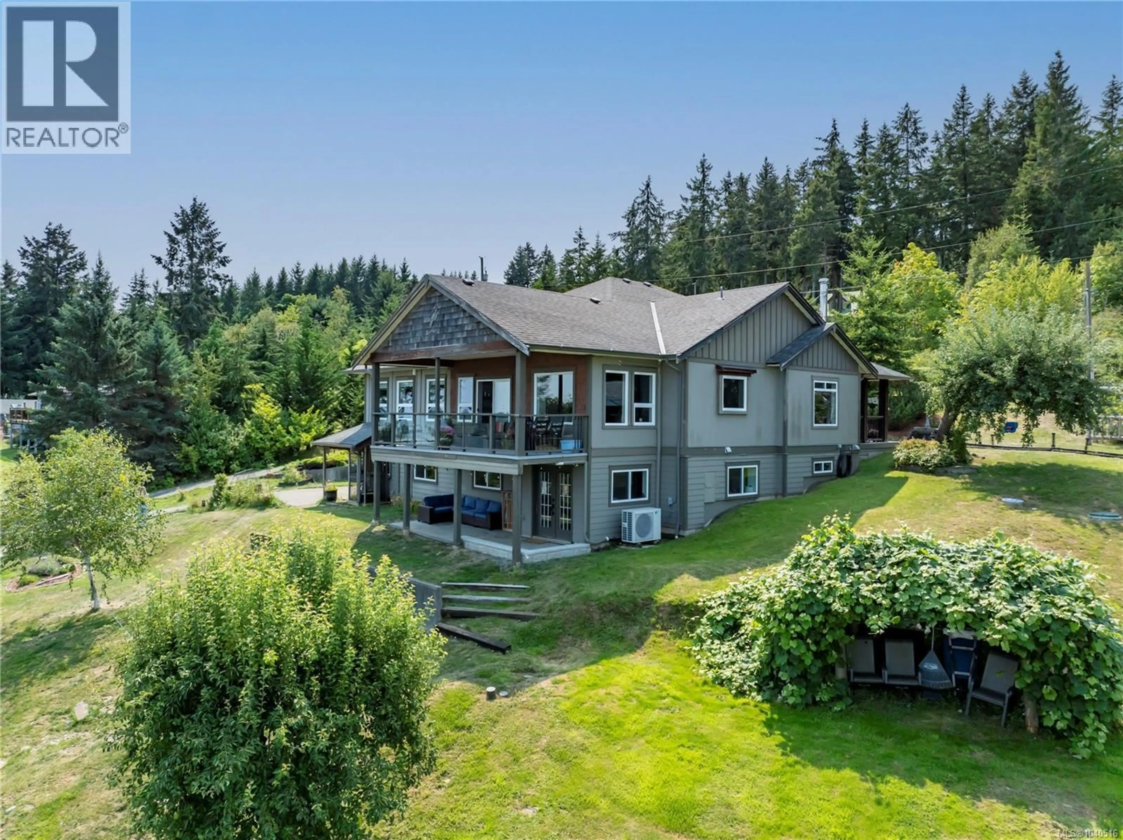 A pic from outside/outdoor area/front of a property/back of a property/a pic from drone, water/lake/river/ocean view for 5763 ISLAND HIGHWAY SOUTH, Union Bay British Columbia V0R3B0