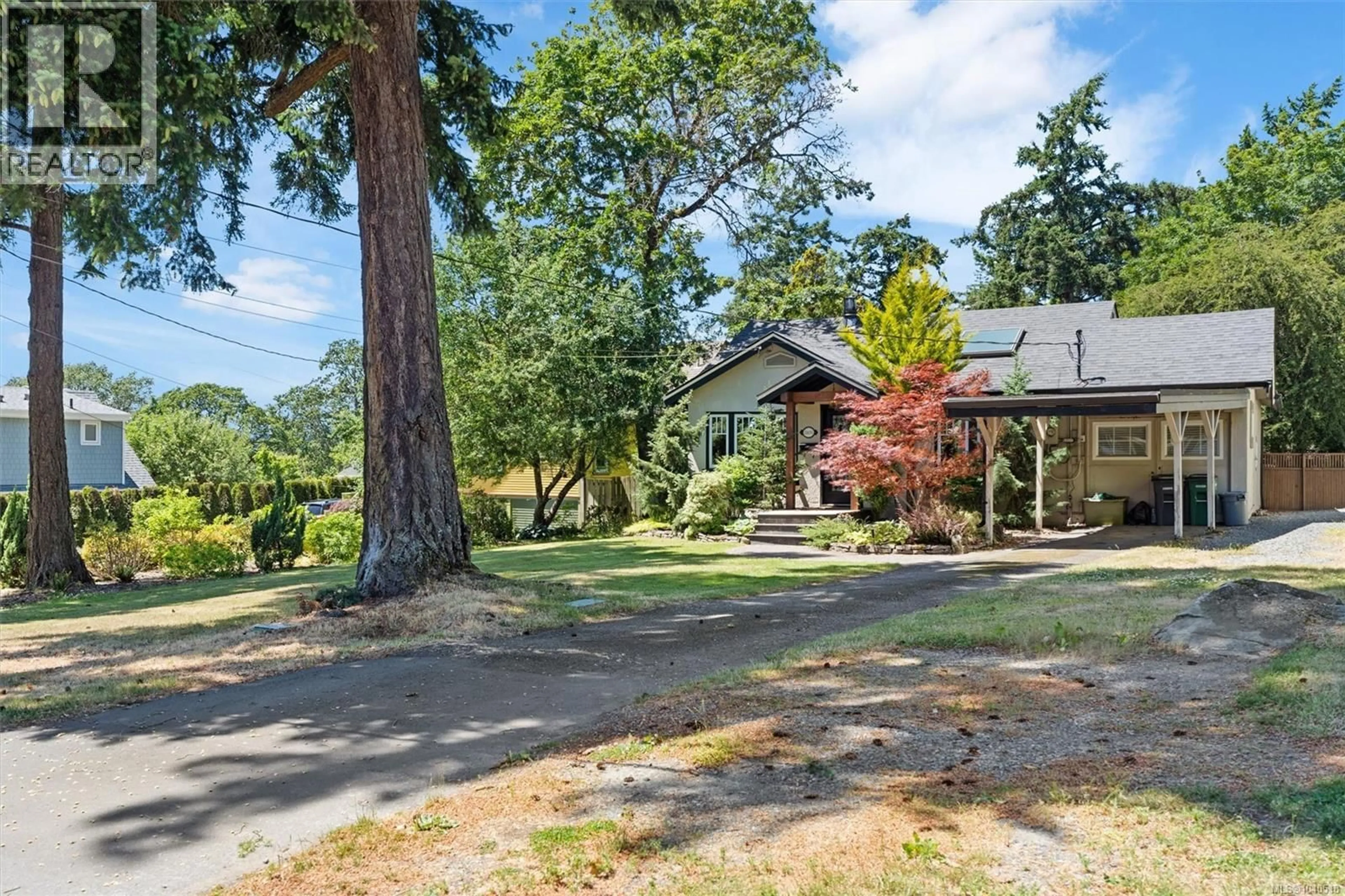 A pic from outside/outdoor area/front of a property/back of a property/a pic from drone, water/lake/river/ocean view for 2876 AUSTIN AVENUE, Saanich British Columbia V9A2K7