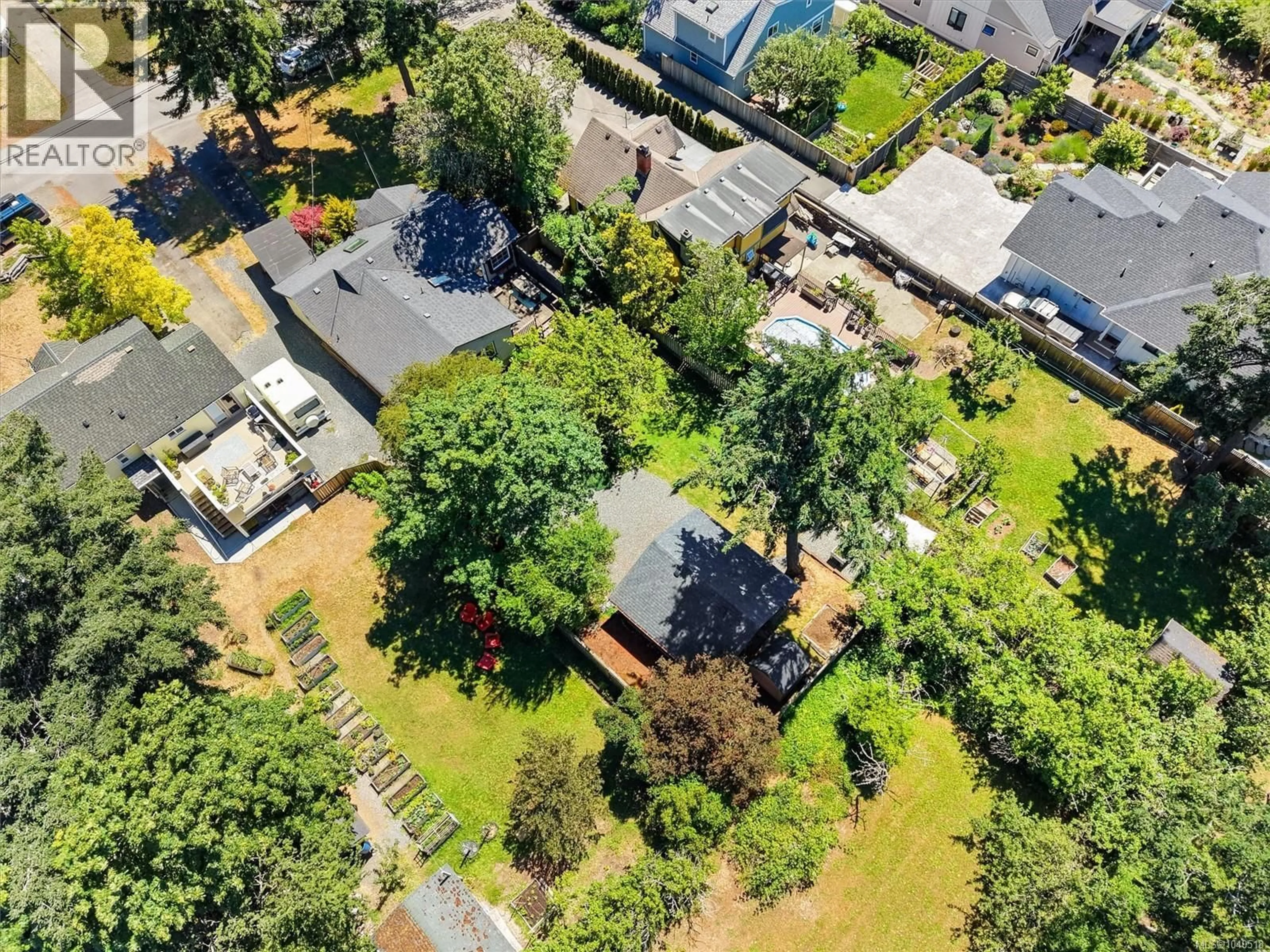 A pic from outside/outdoor area/front of a property/back of a property/a pic from drone, street for 2876 AUSTIN AVENUE, Saanich British Columbia V9A2K7