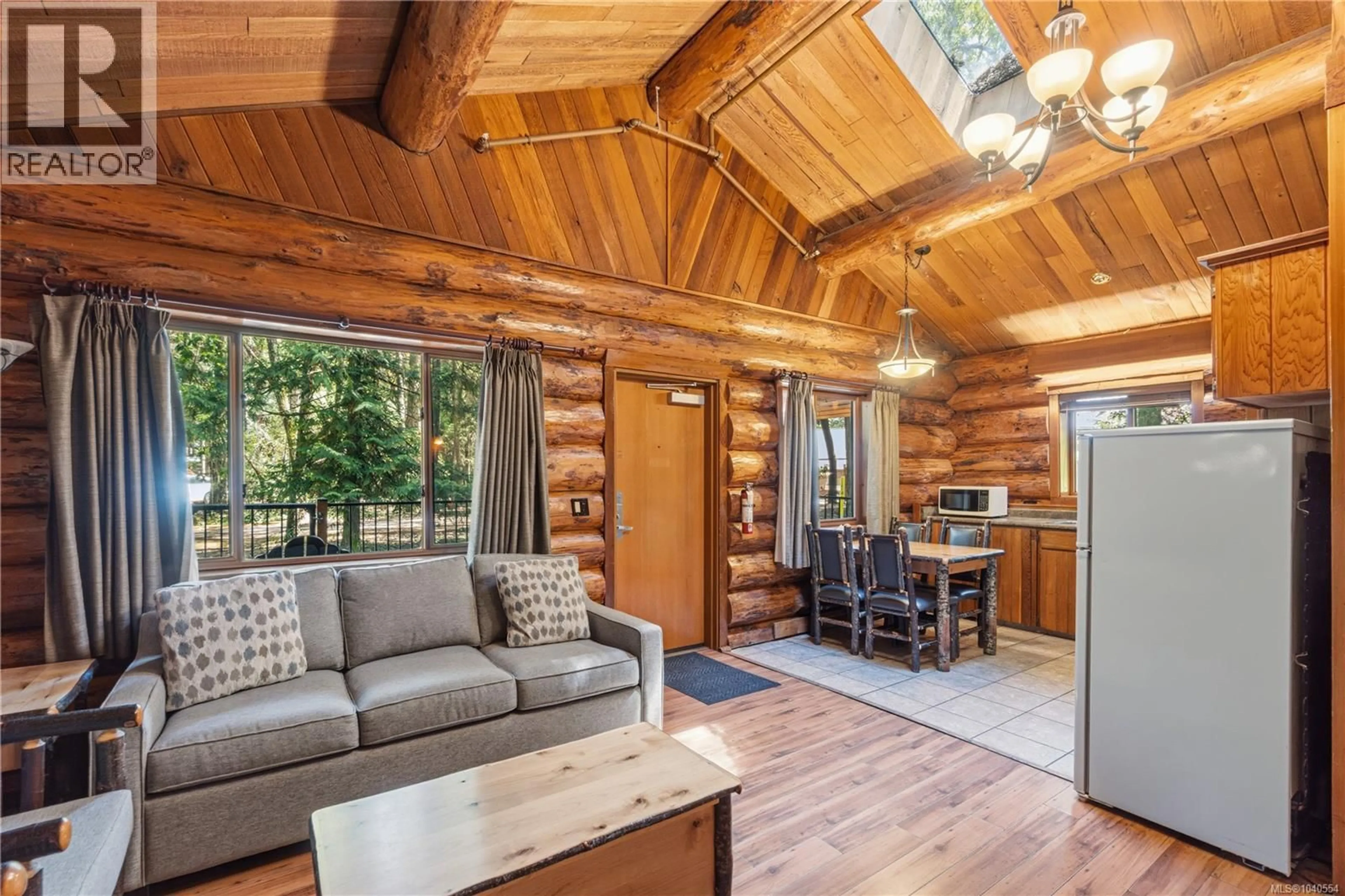 Living room with furniture, wood/laminate floor for 432 - 1155 RESORT DRIVE, Parksville British Columbia V9P2E3