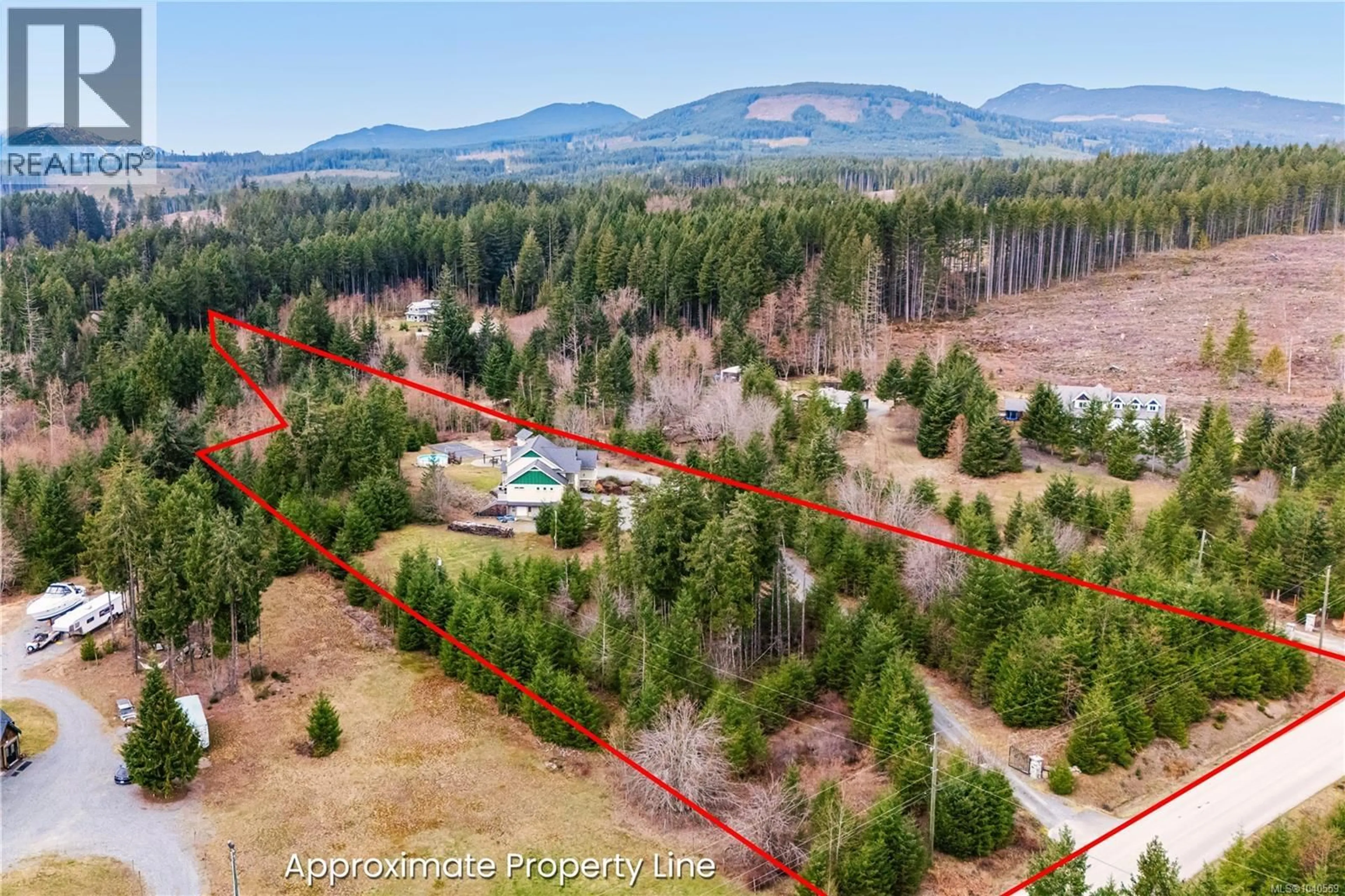 A pic from outside/outdoor area/front of a property/back of a property/a pic from drone, forest/trees view for 2535 ELK TRAILS WAY, Nanaimo British Columbia V9X0A3