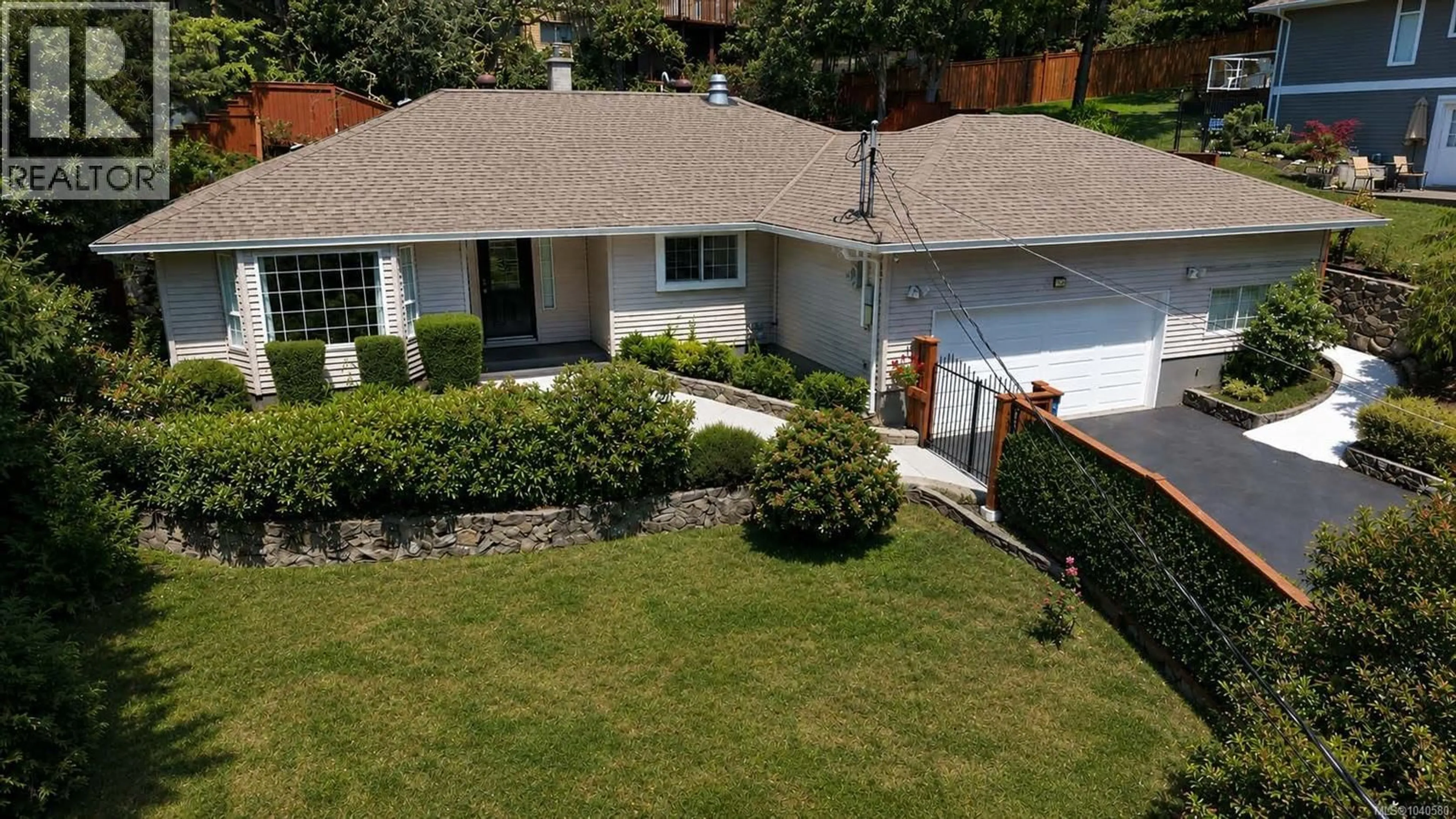 A pic from outside/outdoor area/front of a property/back of a property/a pic from drone, street for 1018 BENVENUTO AVENUE, Central Saanich British Columbia V8M1A1