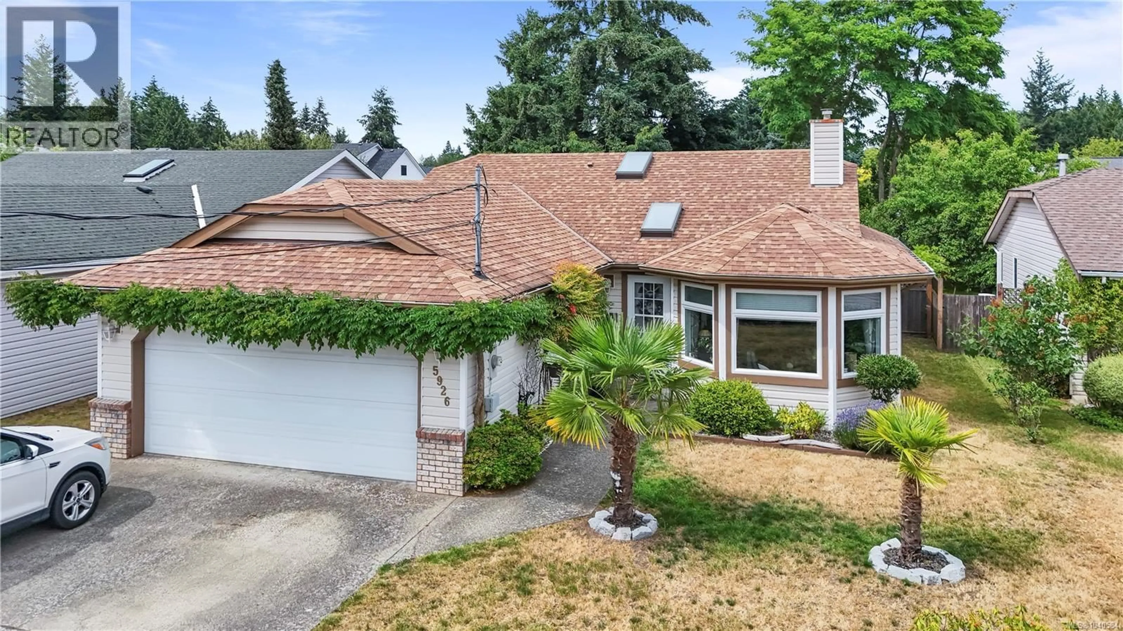 Home with vinyl exterior material, street for 5926 BROADWAY ROAD, Nanaimo British Columbia V9V1E5
