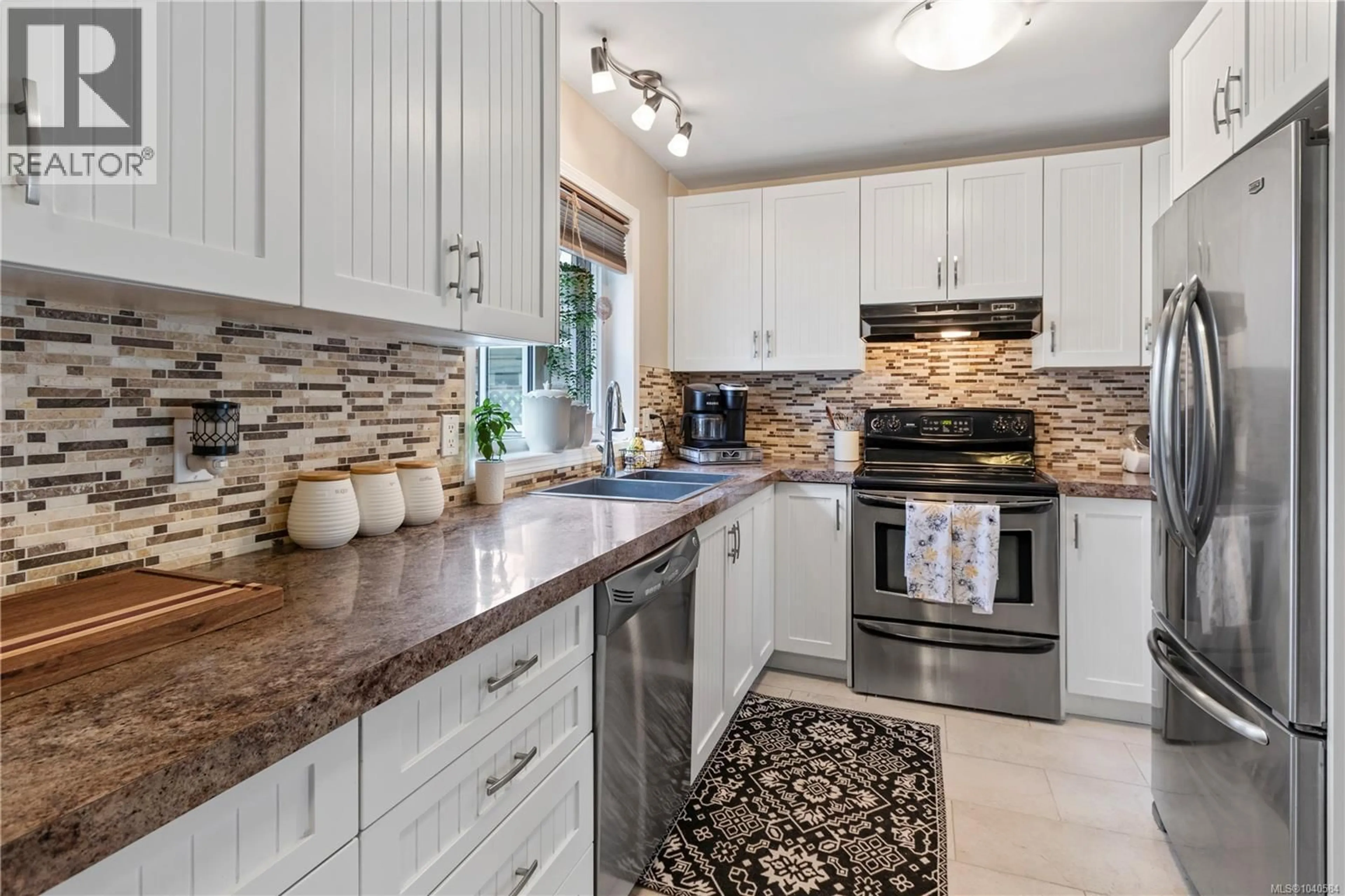 Open concept kitchen, ceramic/tile floor for 5926 BROADWAY ROAD, Nanaimo British Columbia V9V1E5