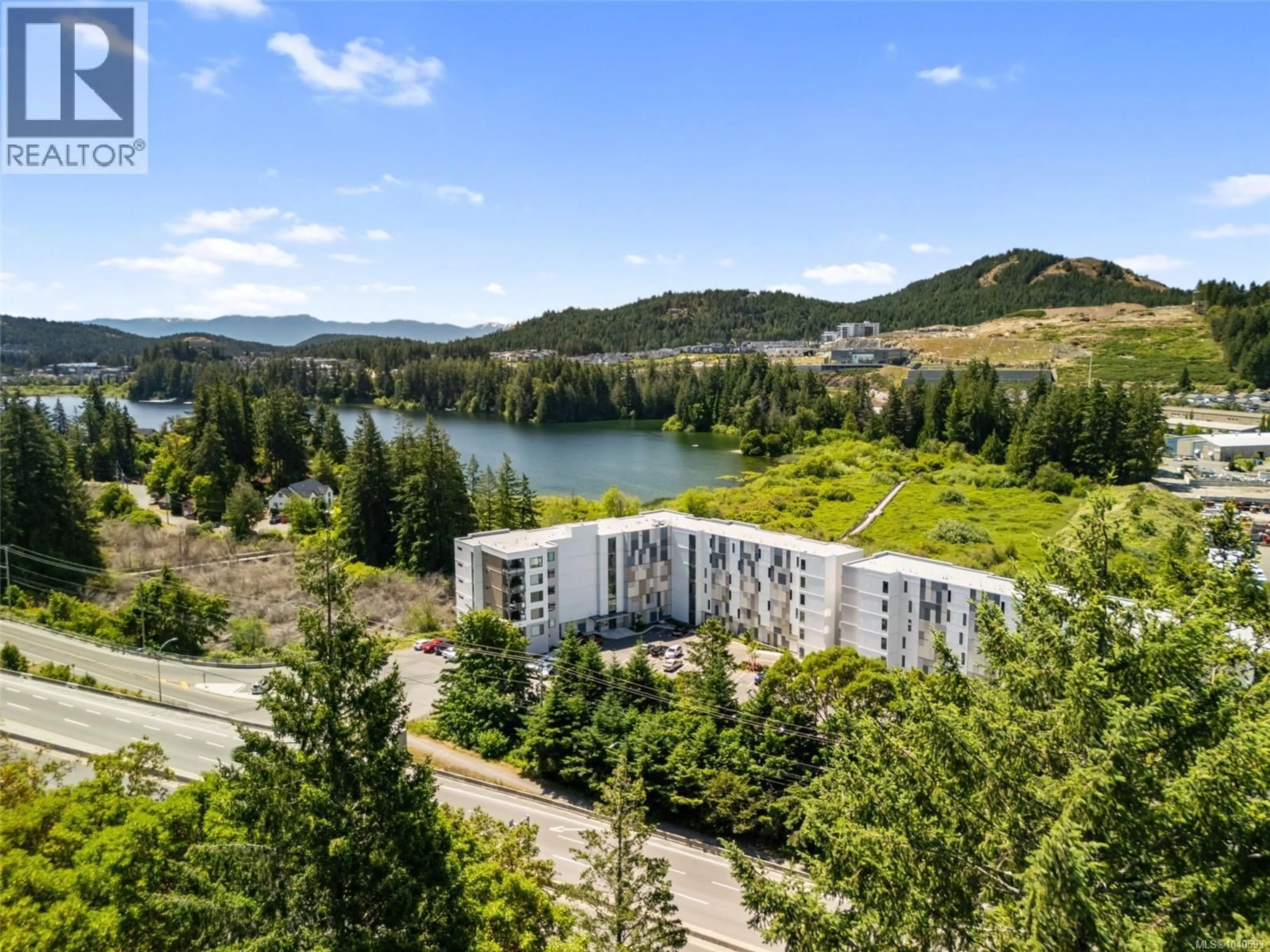 A pic from outside/outdoor area/front of a property/back of a property/a pic from drone, water/lake/river/ocean view for 613 - 1361 GOLDSTREAM AVENUE, Langford British Columbia V9B7B4