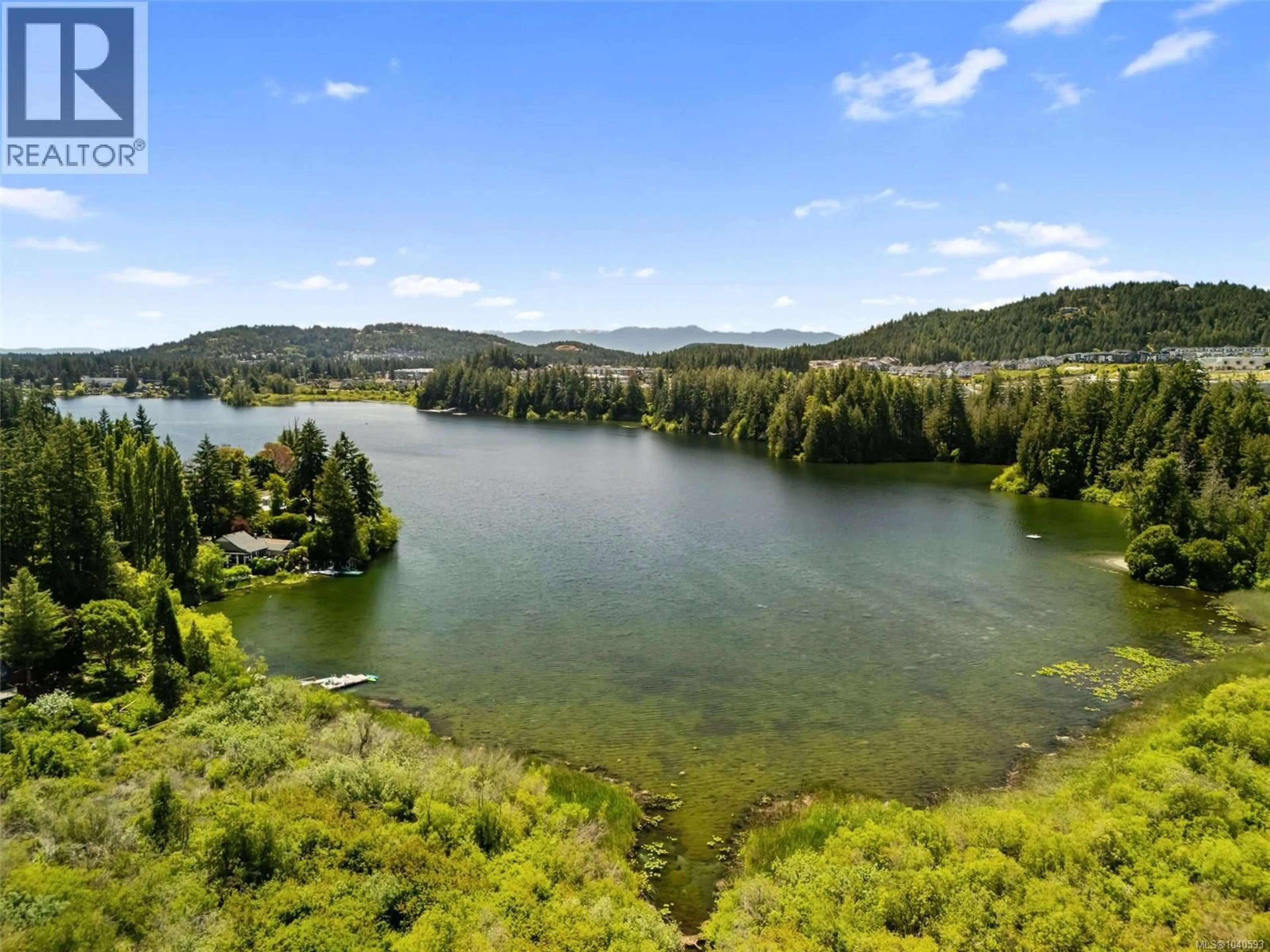 A pic from outside/outdoor area/front of a property/back of a property/a pic from drone, water/lake/river/ocean view for 613 - 1361 GOLDSTREAM AVENUE, Langford British Columbia V9B7B4