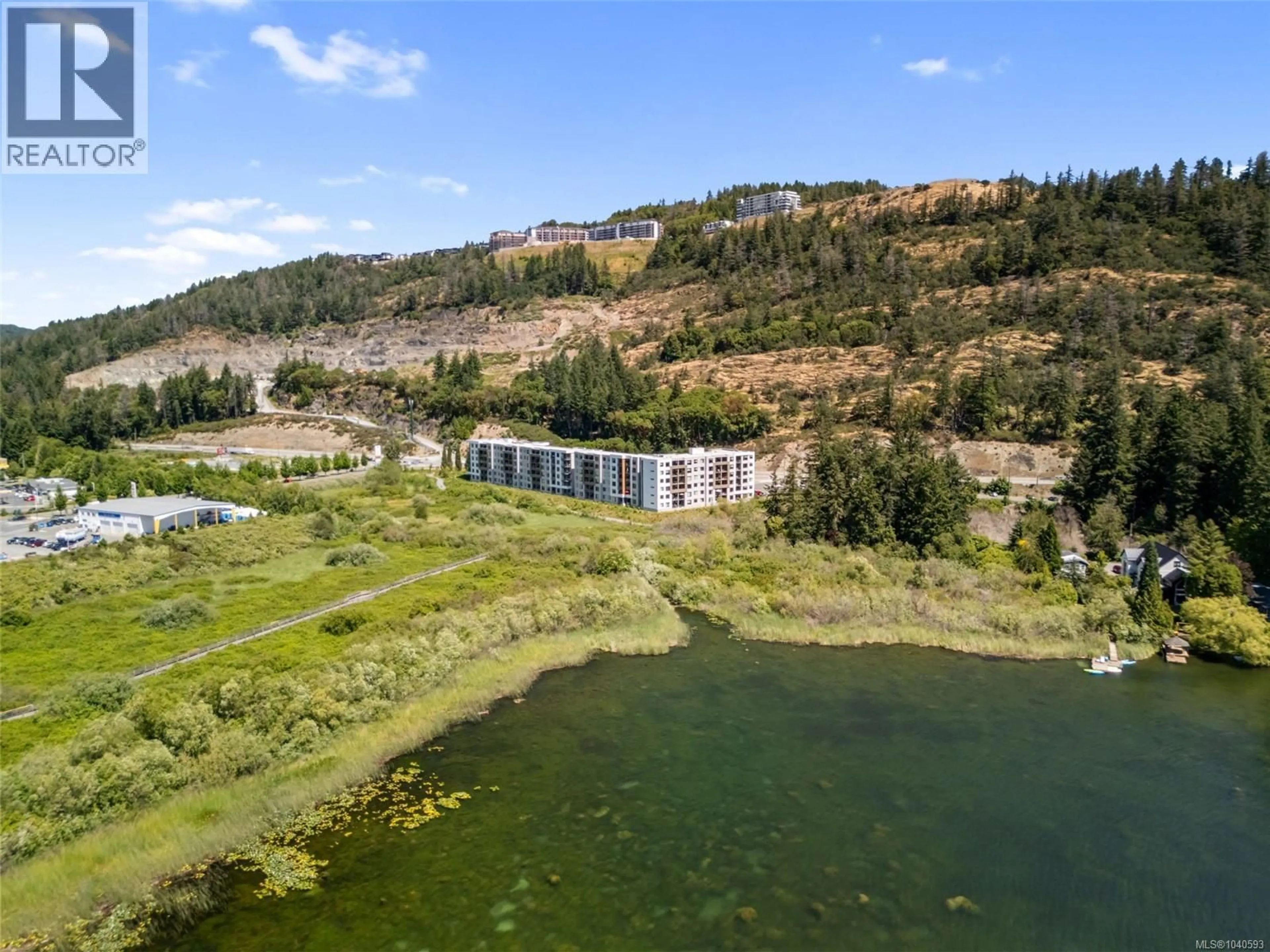 A pic from outside/outdoor area/front of a property/back of a property/a pic from drone, water/lake/river/ocean view for 613 - 1361 GOLDSTREAM AVENUE, Langford British Columbia V9B7B4