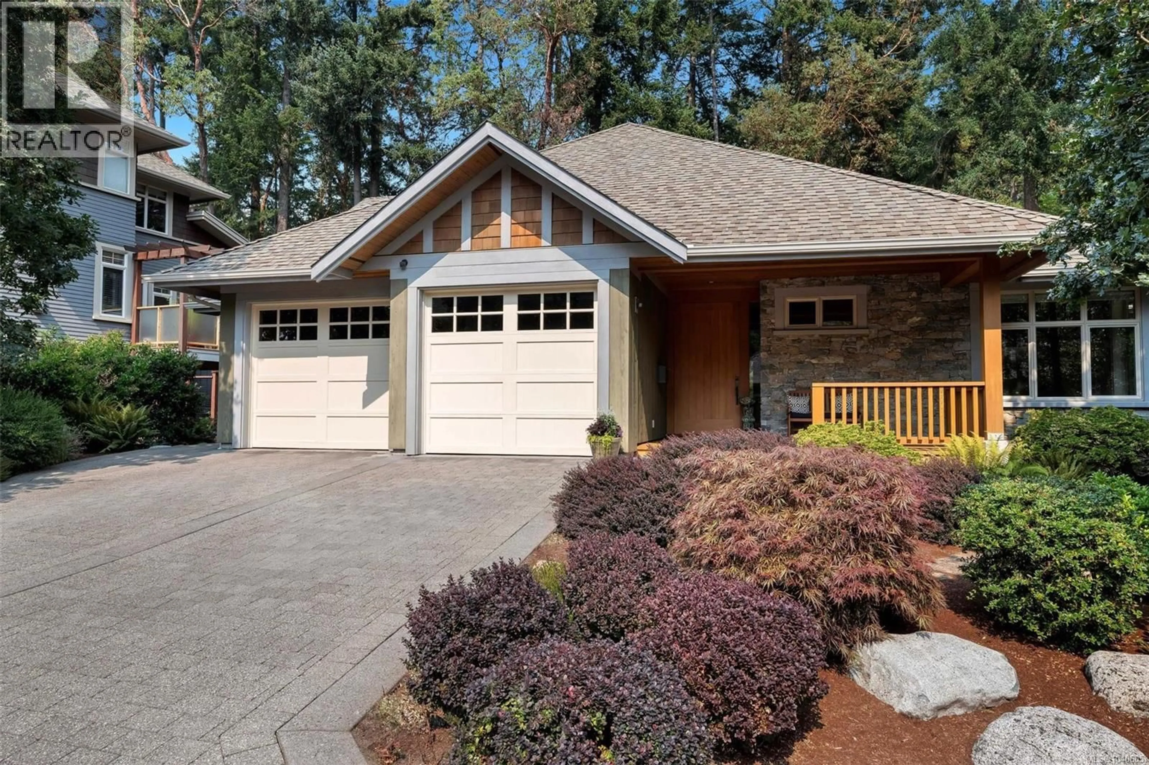 Home with brick exterior material, street for 1259 OCEANWOOD LANE, Saanich British Columbia V8X0A4