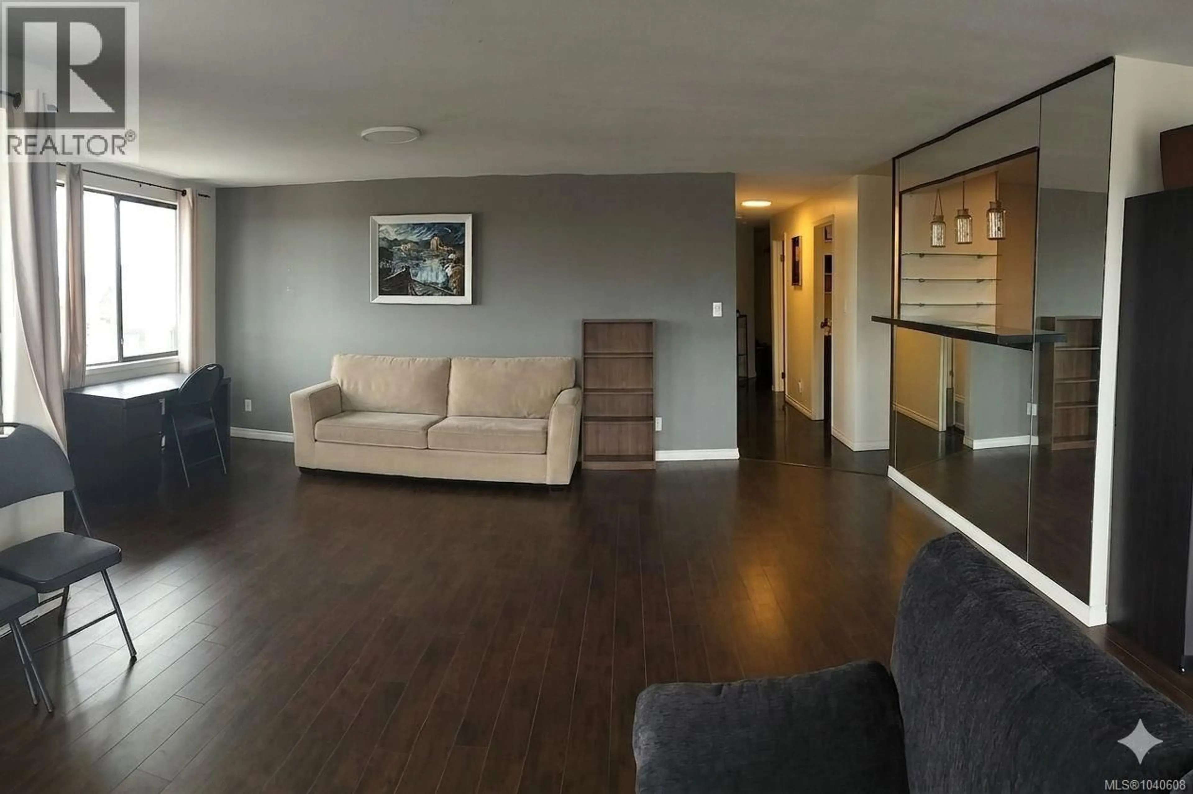 Living room with furniture, wood/laminate floor for 302 - 30 CAVAN STREET, Nanaimo British Columbia V9R6K3