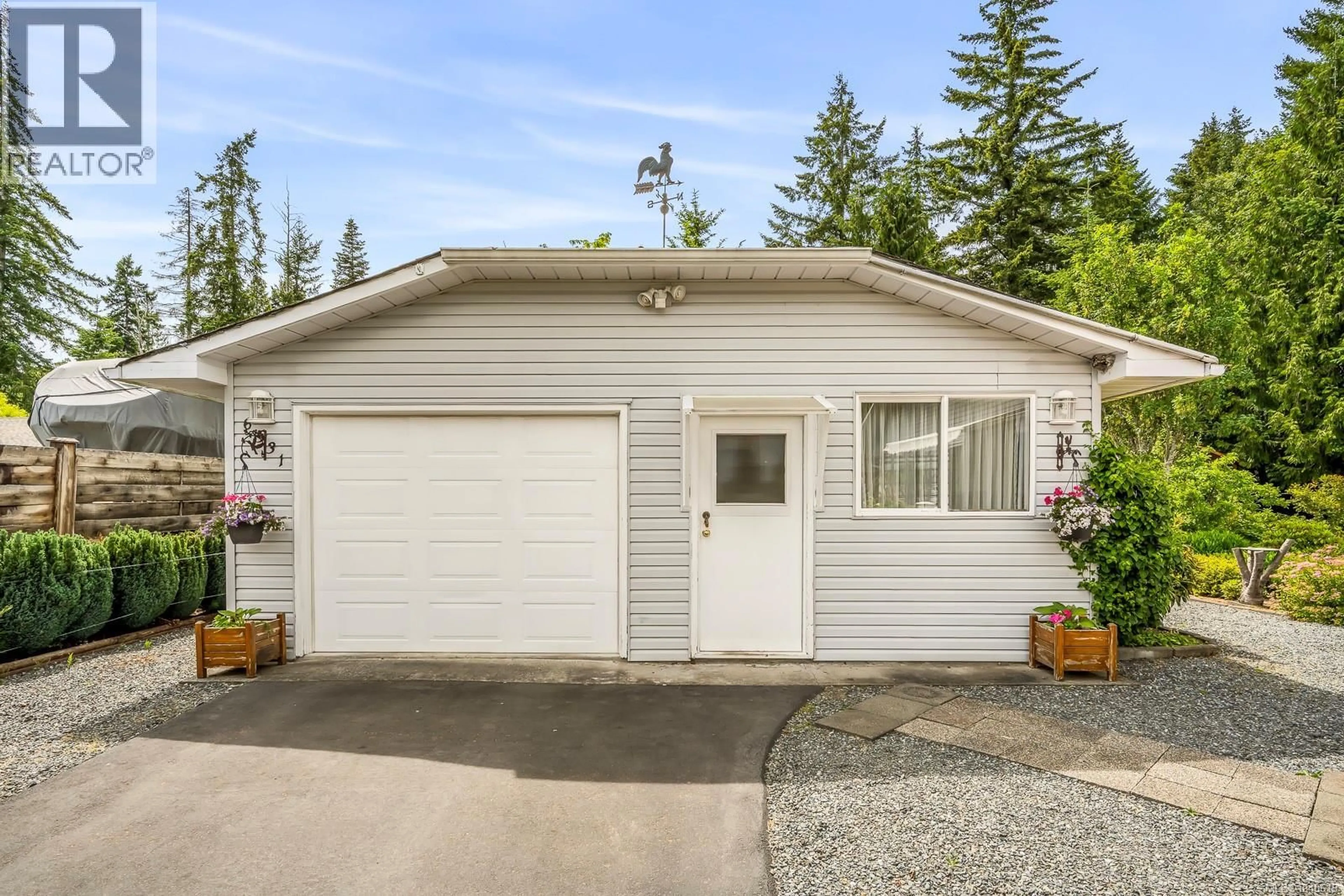 Indoor garage for 6531 MYSTERY BEACH ROAD, Fanny Bay British Columbia V0R1W0