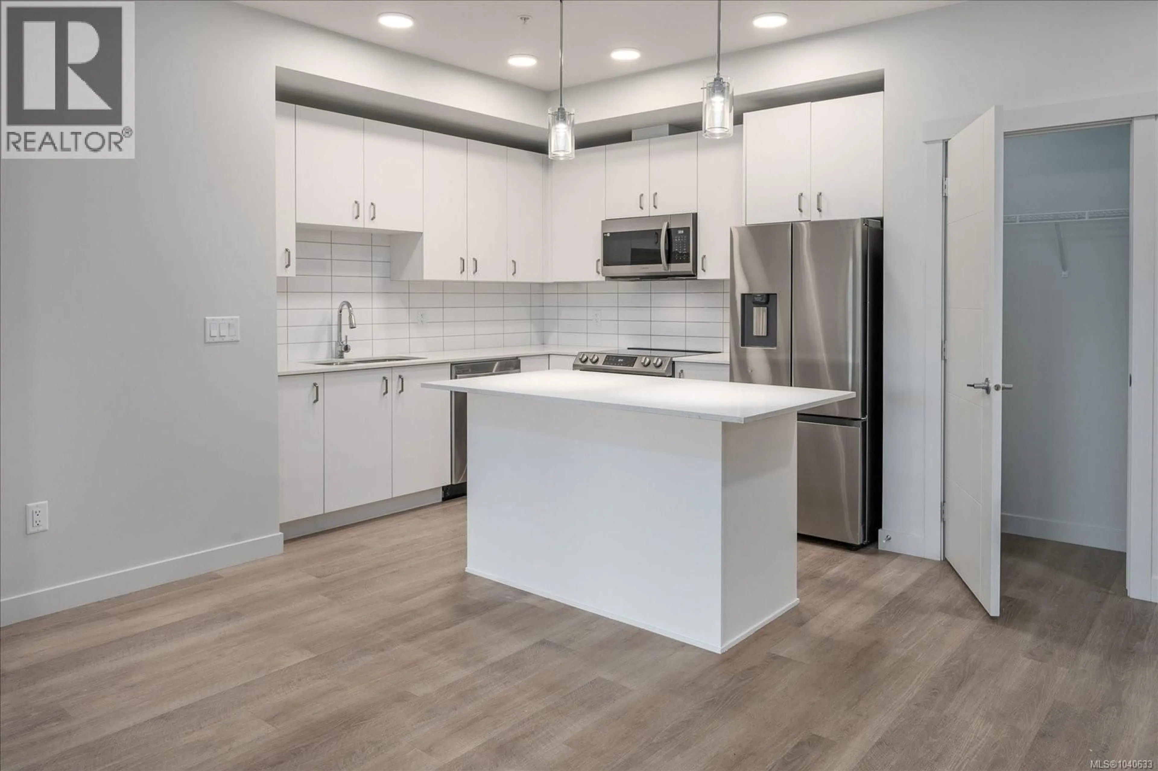 Open concept kitchen, unknown for 209 - 164 ALBERNI HIGHWAY, Parksville British Columbia V9P1L9