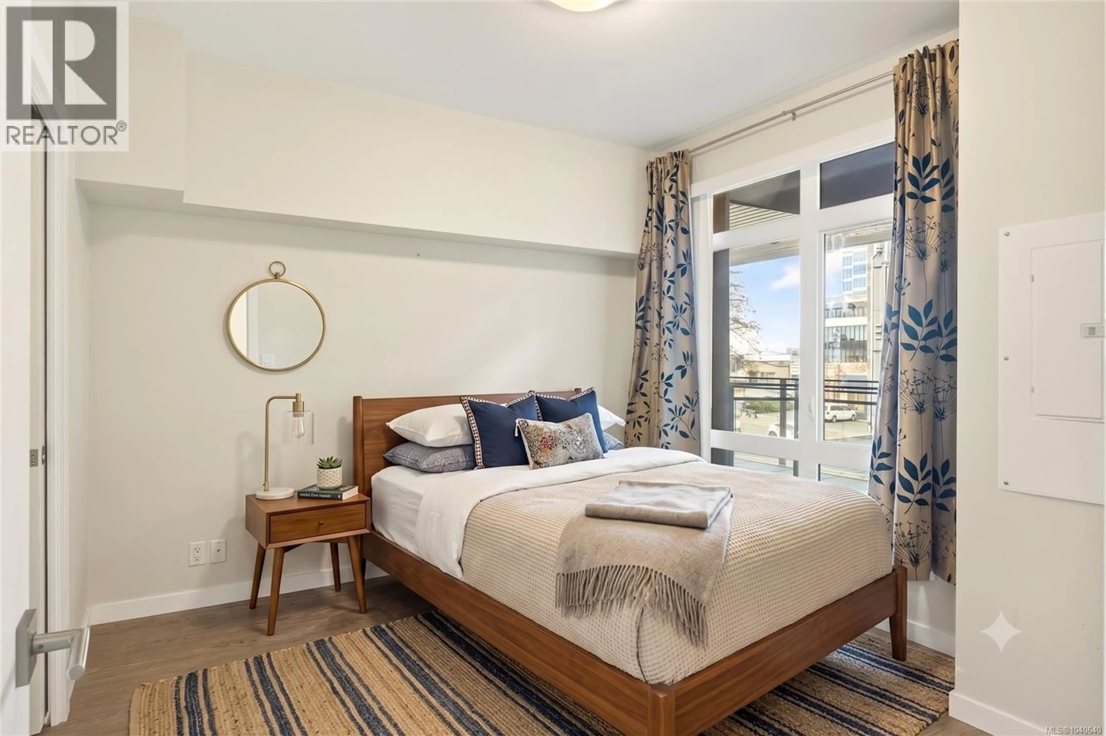 Bedroom with bed, carpet floor for 310 - 91 CHAPEL STREET, Nanaimo British Columbia V9R0J3