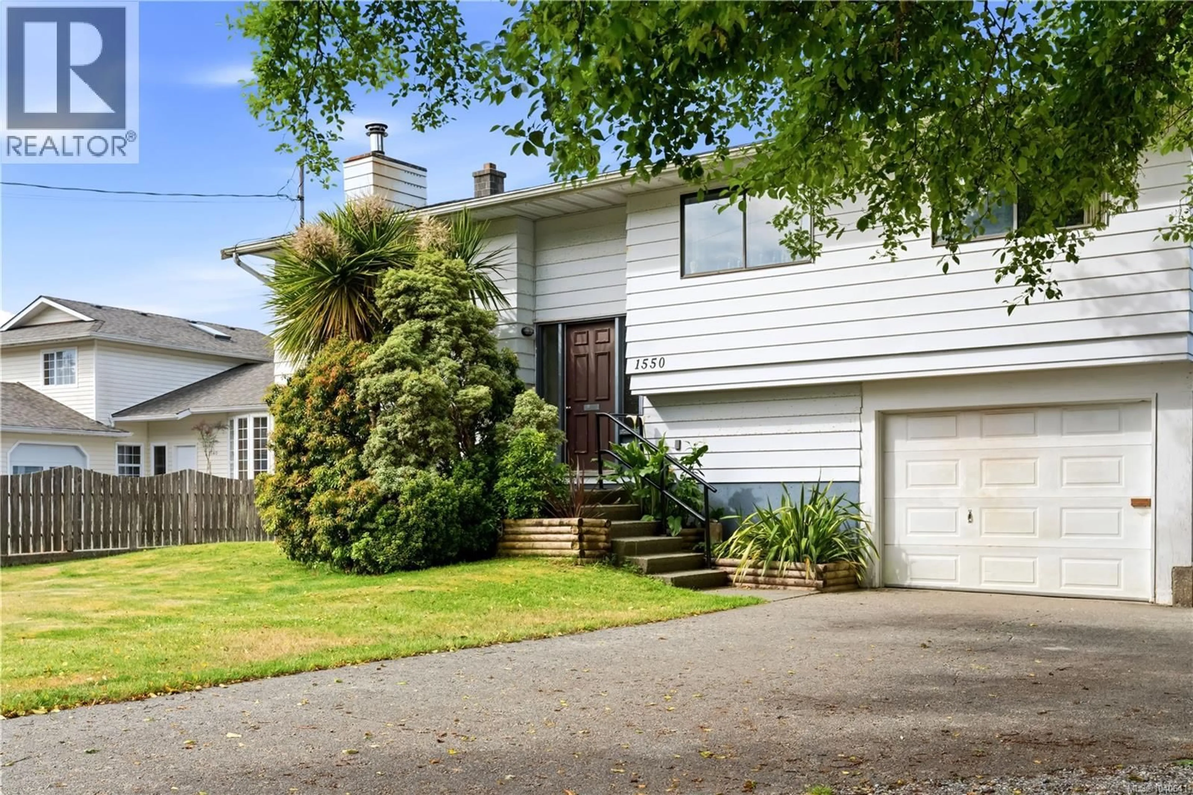 Home with vinyl exterior material, street for 1550 LARCH ROAD, Ucluelet British Columbia V0R3A0