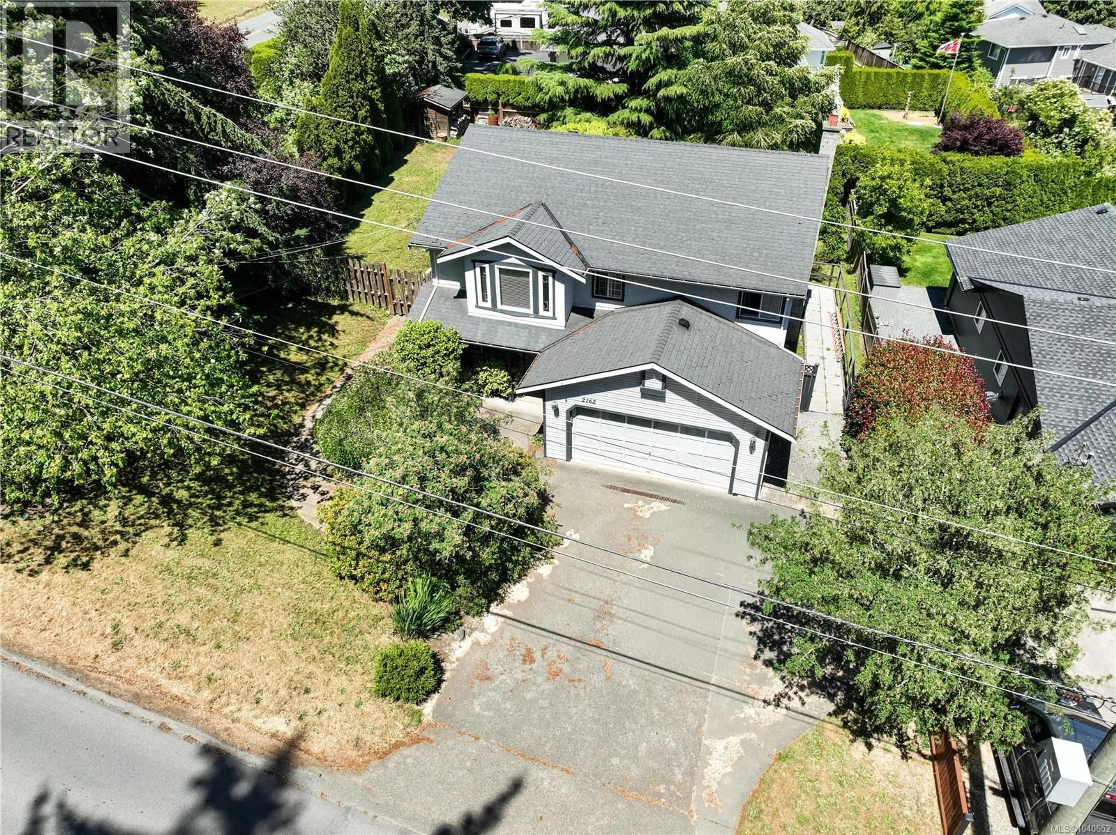 A pic from outside/outdoor area/front of a property/back of a property/a pic from drone, street for 2162 STELLY'S CROSS ROAD, Central Saanich British Columbia V8M1M3