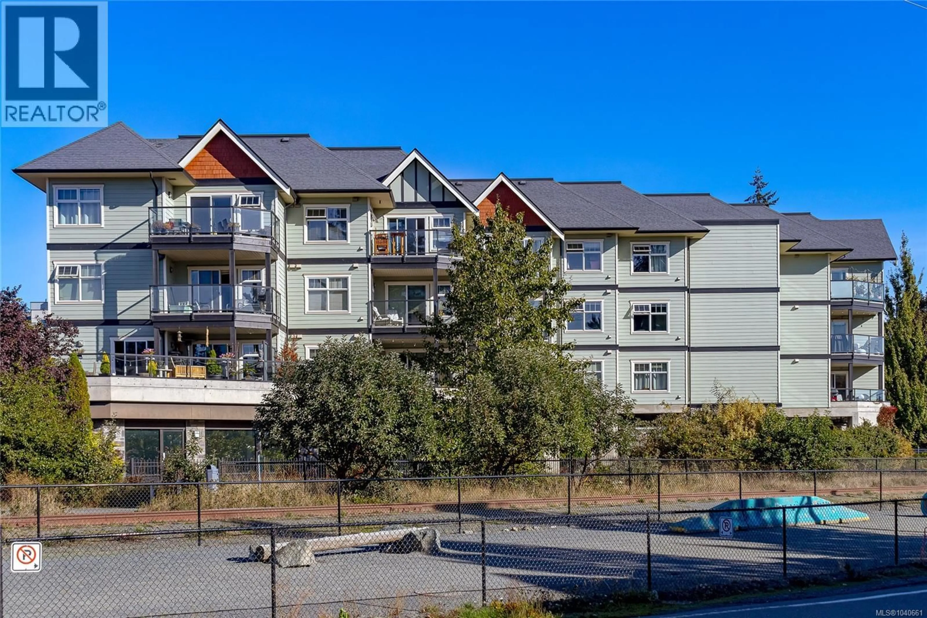 A pic from outside/outdoor area/front of a property/back of a property/a pic from drone, mountain view for 303 - 2881 PEATT ROAD, Langford British Columbia V9B3V7