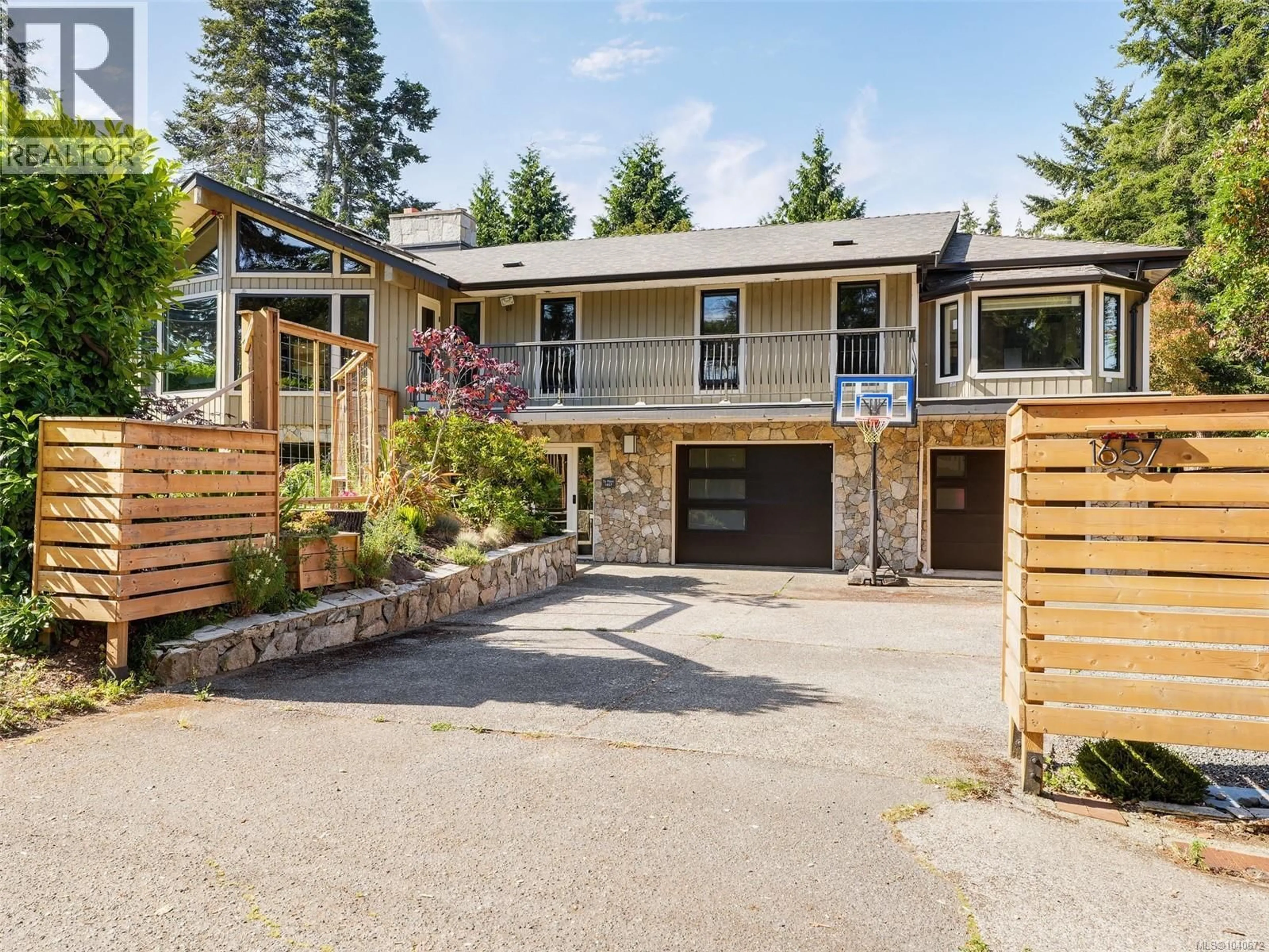 Home with brick exterior material, unknown for 1657 ASH ROAD, Saanich British Columbia V8N2T2