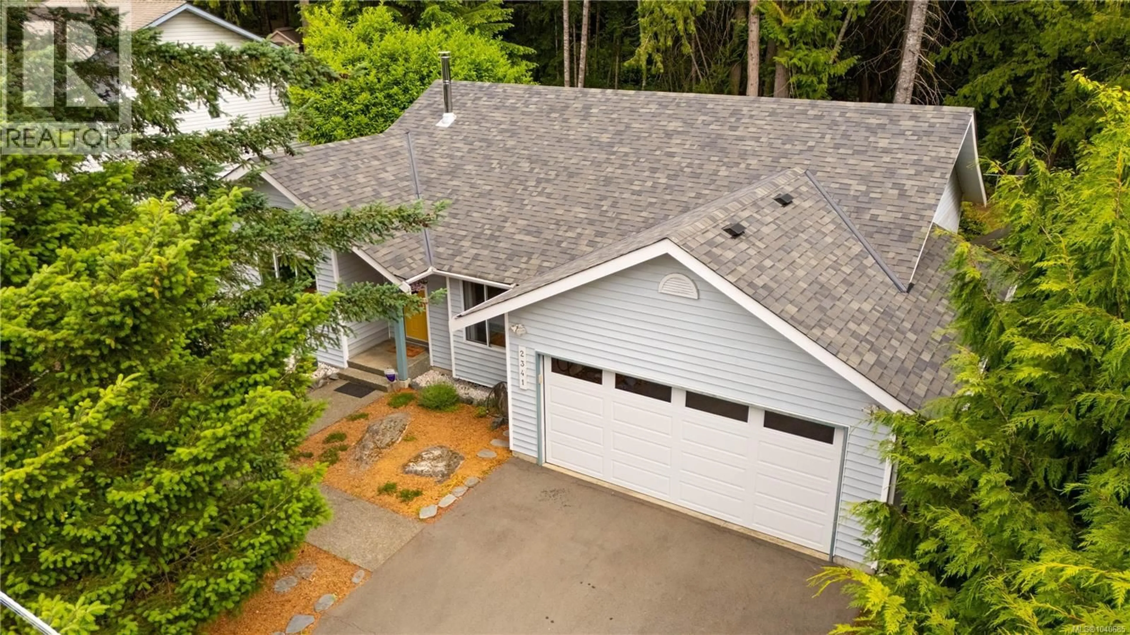 A pic from outside/outdoor area/front of a property/back of a property/a pic from drone, street for 2341 RAVENHILL ROAD, Shawnigan Lake British Columbia V8H2H2