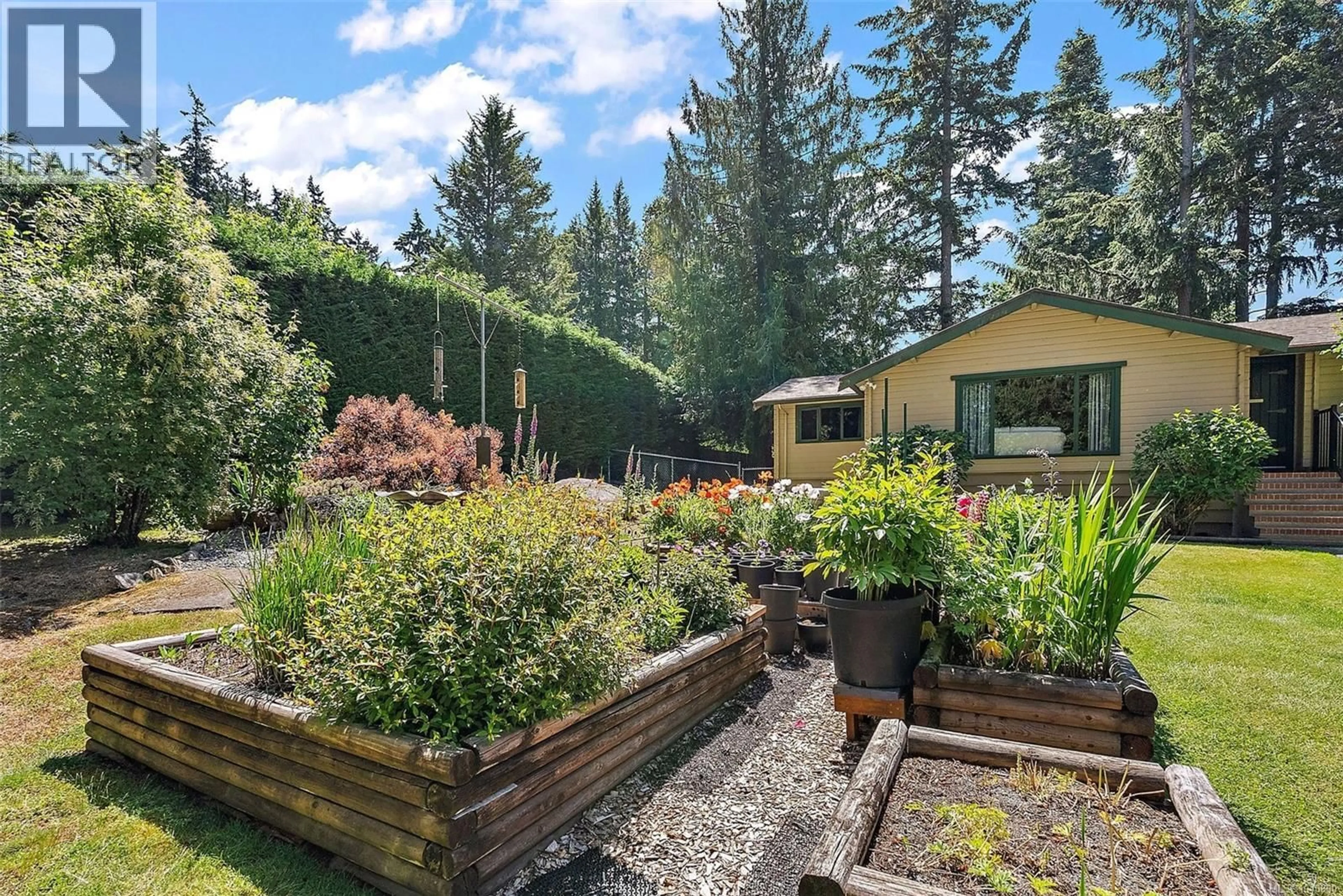 A pic from outside/outdoor area/front of a property/back of a property/a pic from drone, unknown for 1887 LLEWELLYN PLACE, North Saanich British Columbia V8L1G4