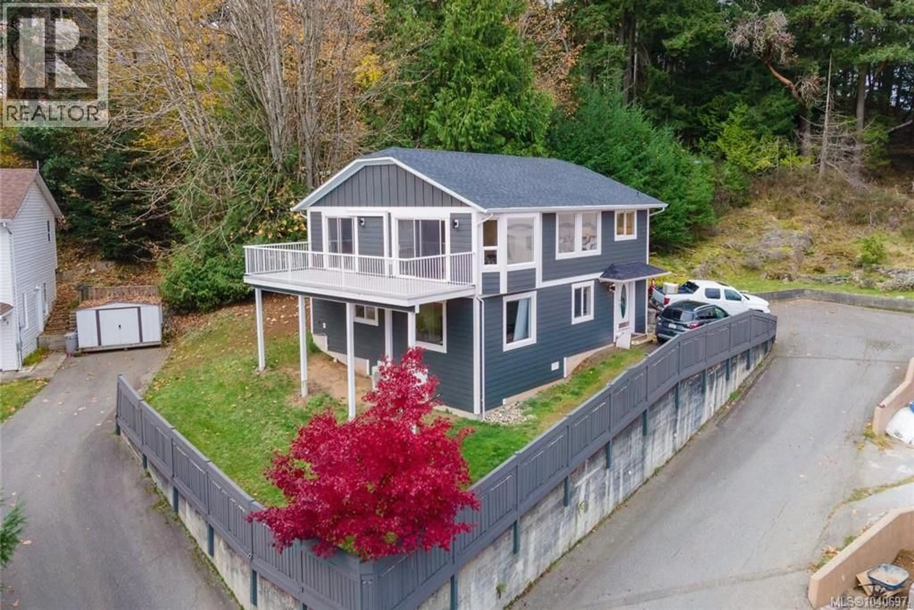 A pic from outside/outdoor area/front of a property/back of a property/a pic from drone, unknown for 671 MARSH WREN PLACE, Nanaimo British Columbia V9T5R4