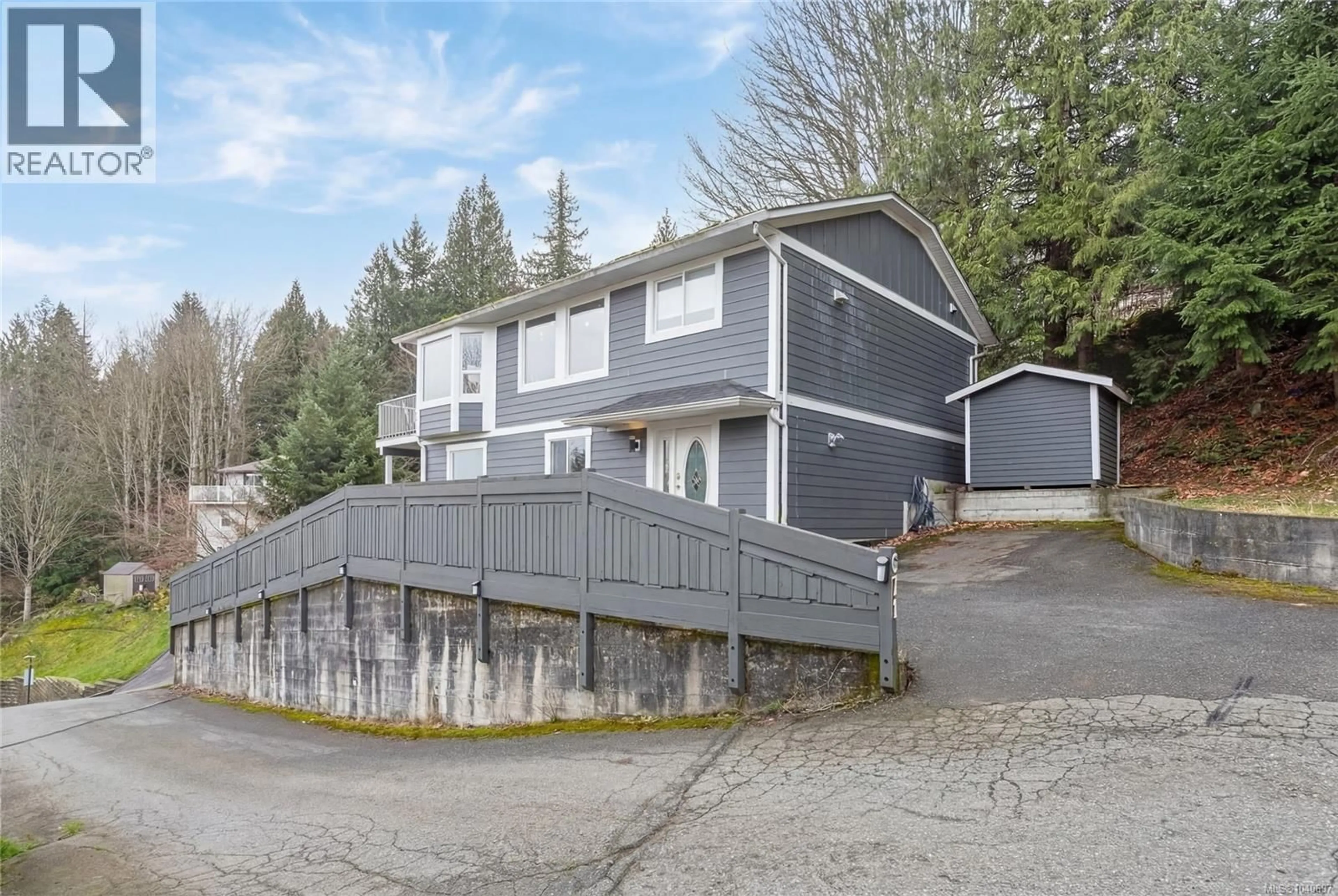 A pic from outside/outdoor area/front of a property/back of a property/a pic from drone, unknown for 671 MARSH WREN PLACE, Nanaimo British Columbia V9T5R4