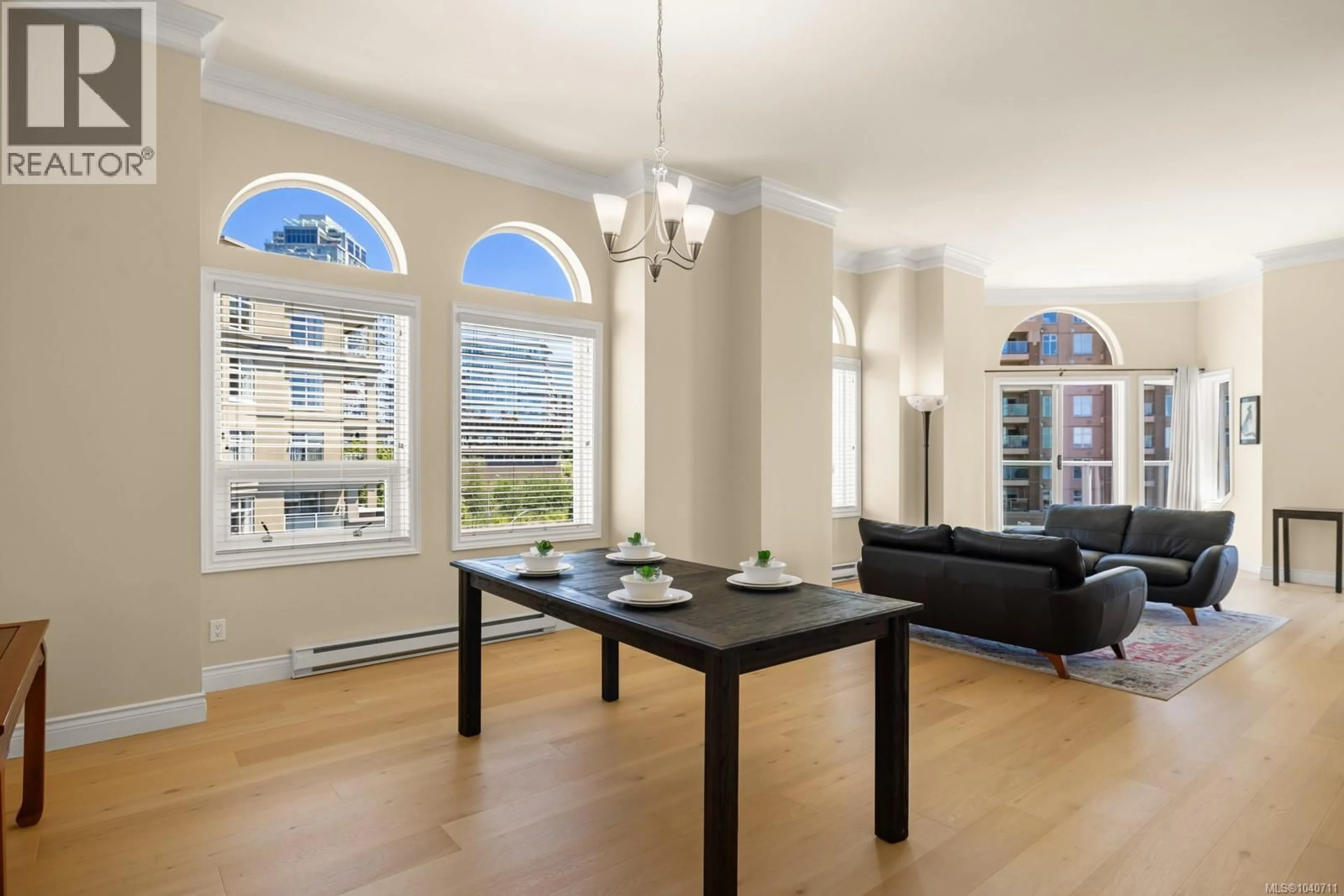 Dining room, wood/laminate floor for 518 - 10 PAUL KANE PLACE, Victoria British Columbia V9A7J8