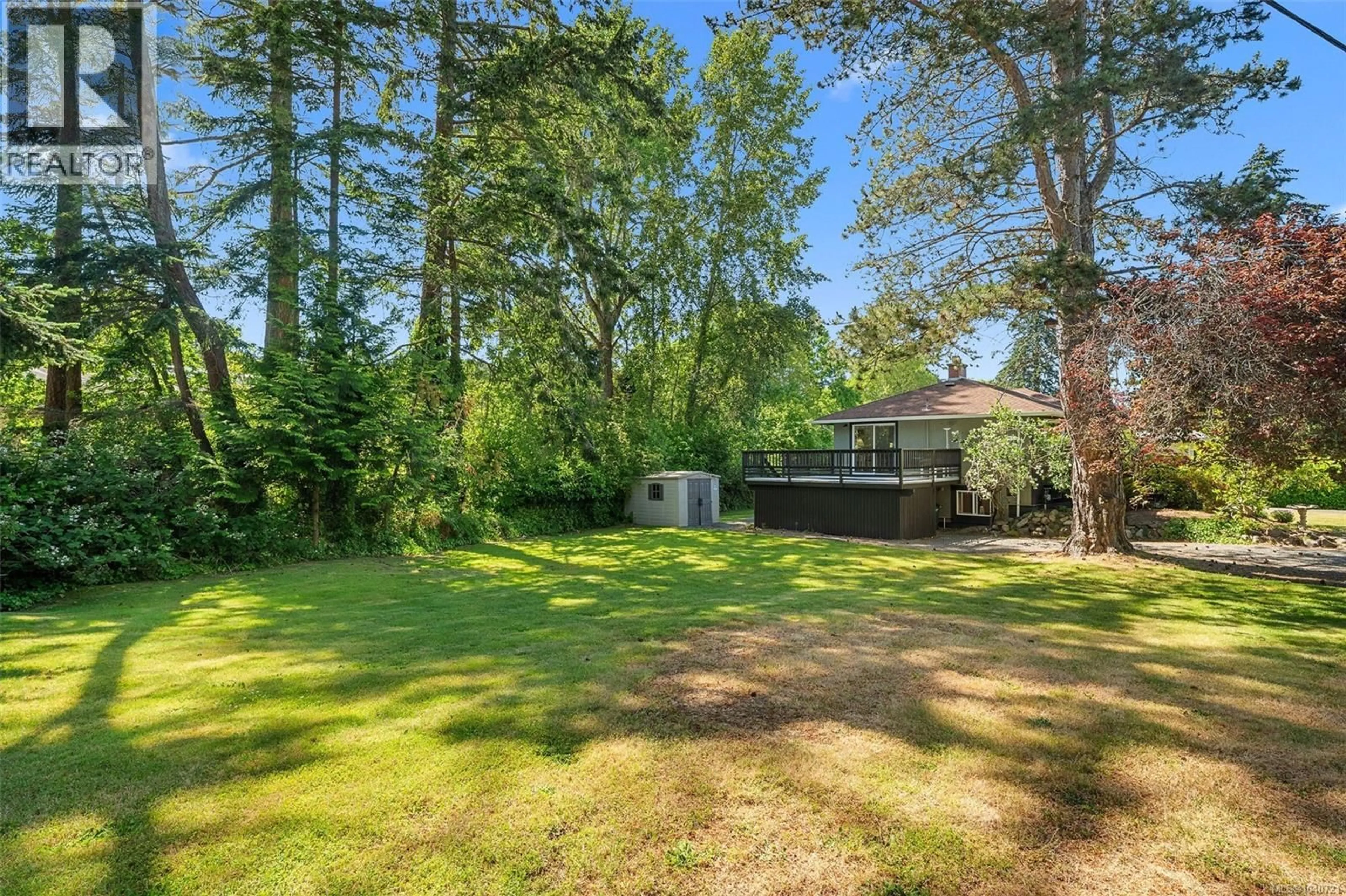 A pic from outside/outdoor area/front of a property/back of a property/a pic from drone, forest/trees view for 3990 HARO ROAD, Saanich British Columbia V8N4A9