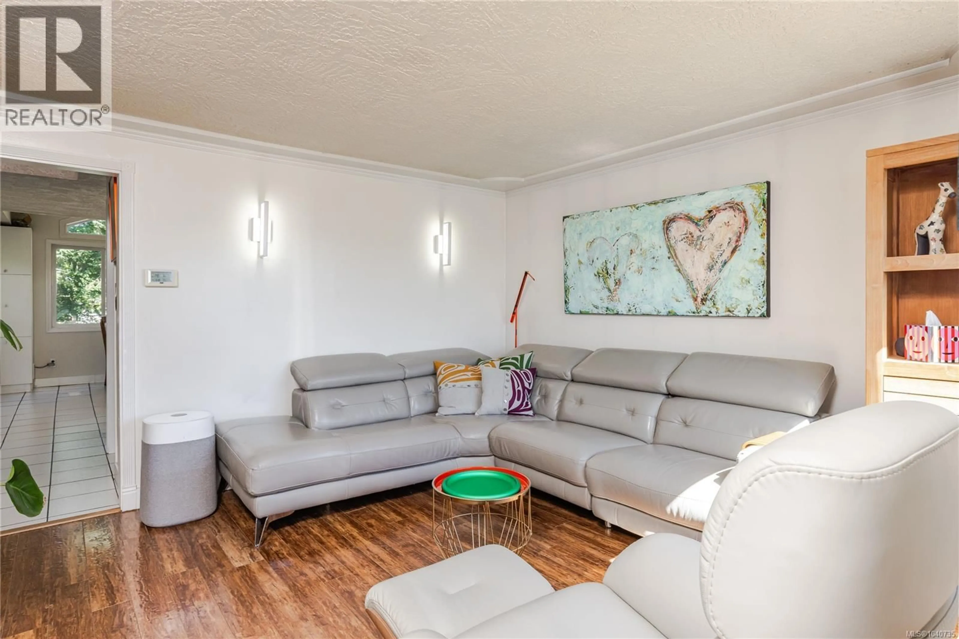 Living room with furniture, wood/laminate floor for 149 STRICKLAND STREET, Nanaimo British Columbia V9R4S3