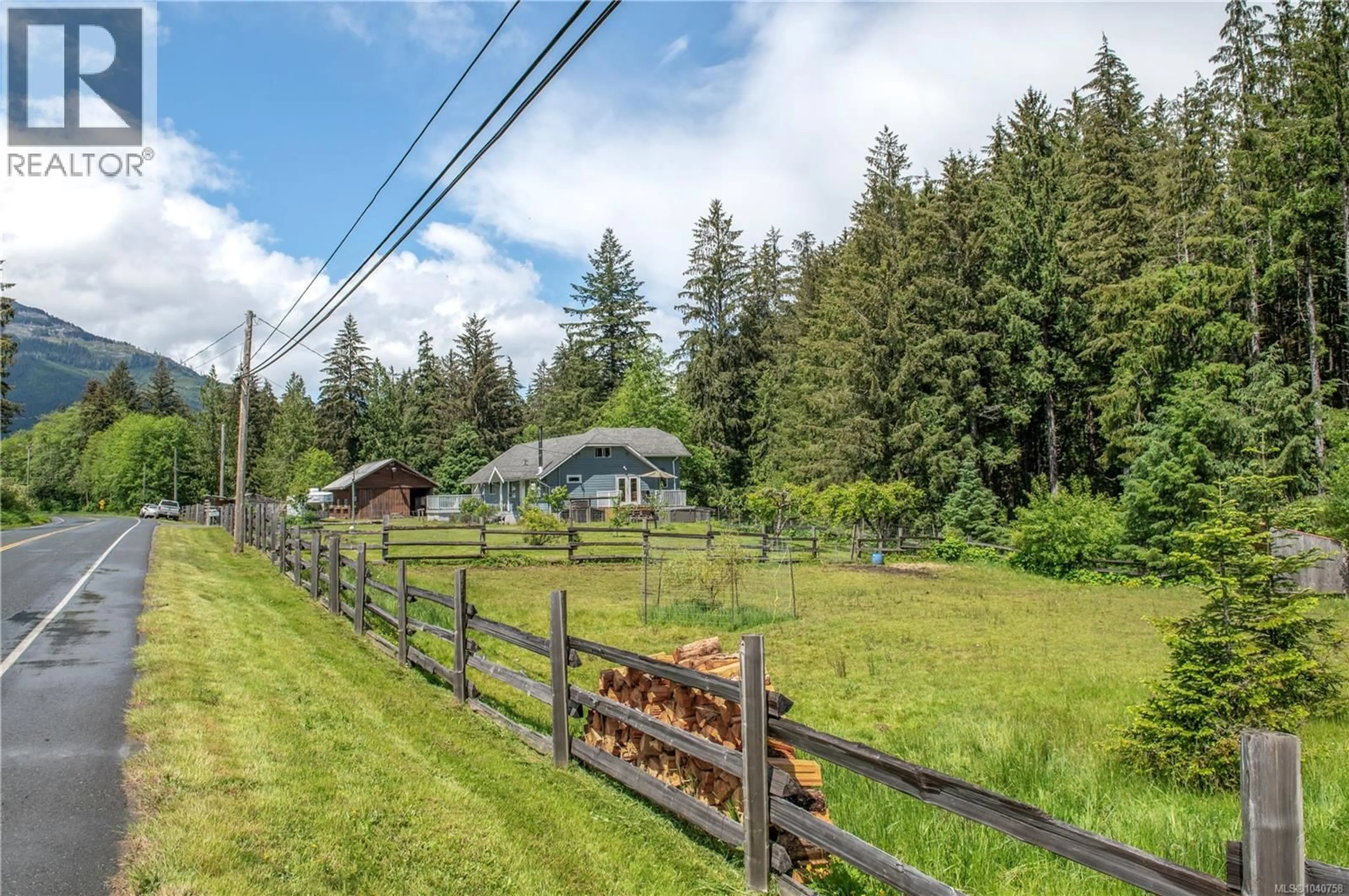 A pic from outside/outdoor area/front of a property/back of a property/a pic from drone, forest/trees view for 870 SAYWARD ROAD, Sayward British Columbia V0P1R0