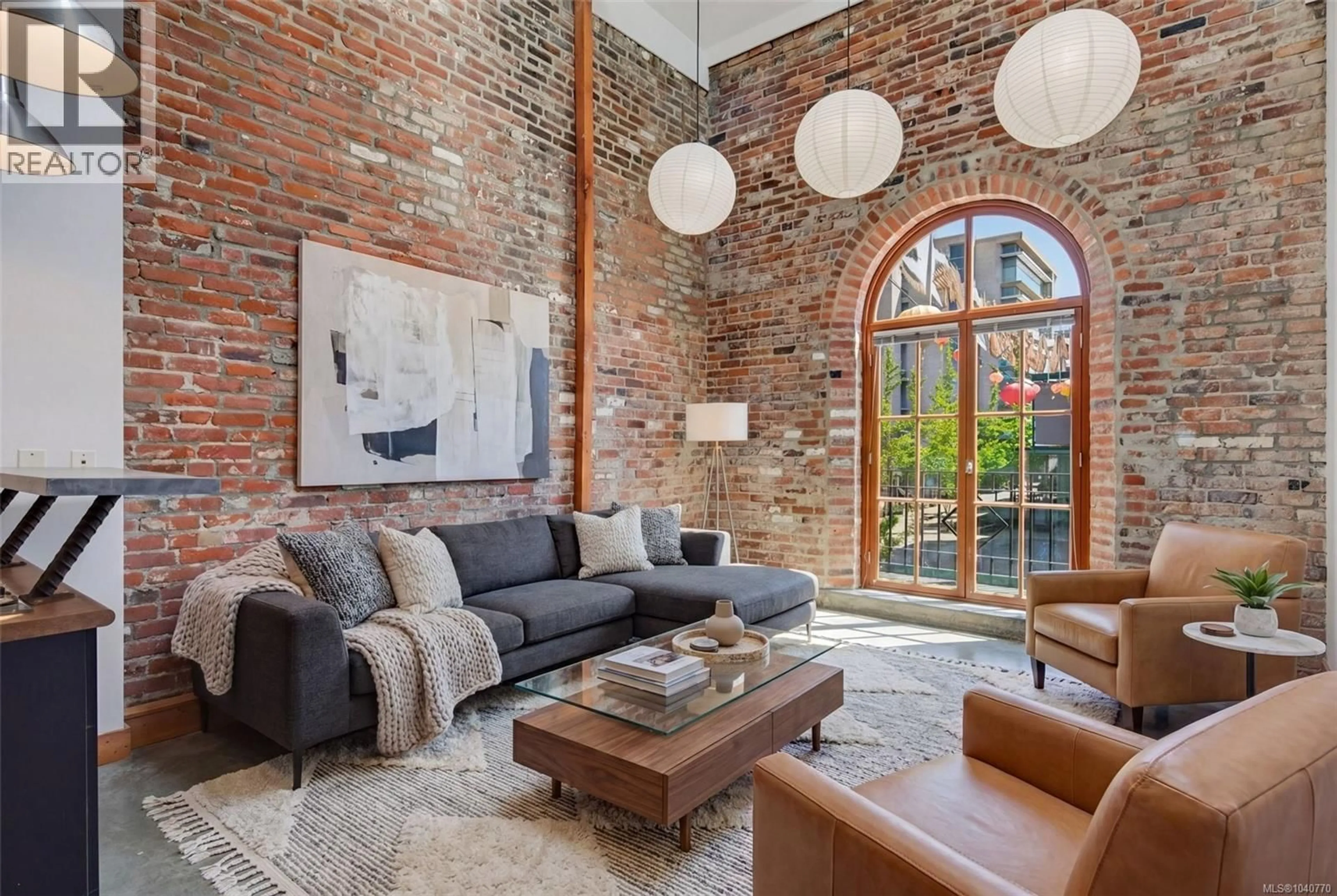 Living room with furniture, unknown for 209 - 588 PANDORA AVENUE, Victoria British Columbia V8W1N7