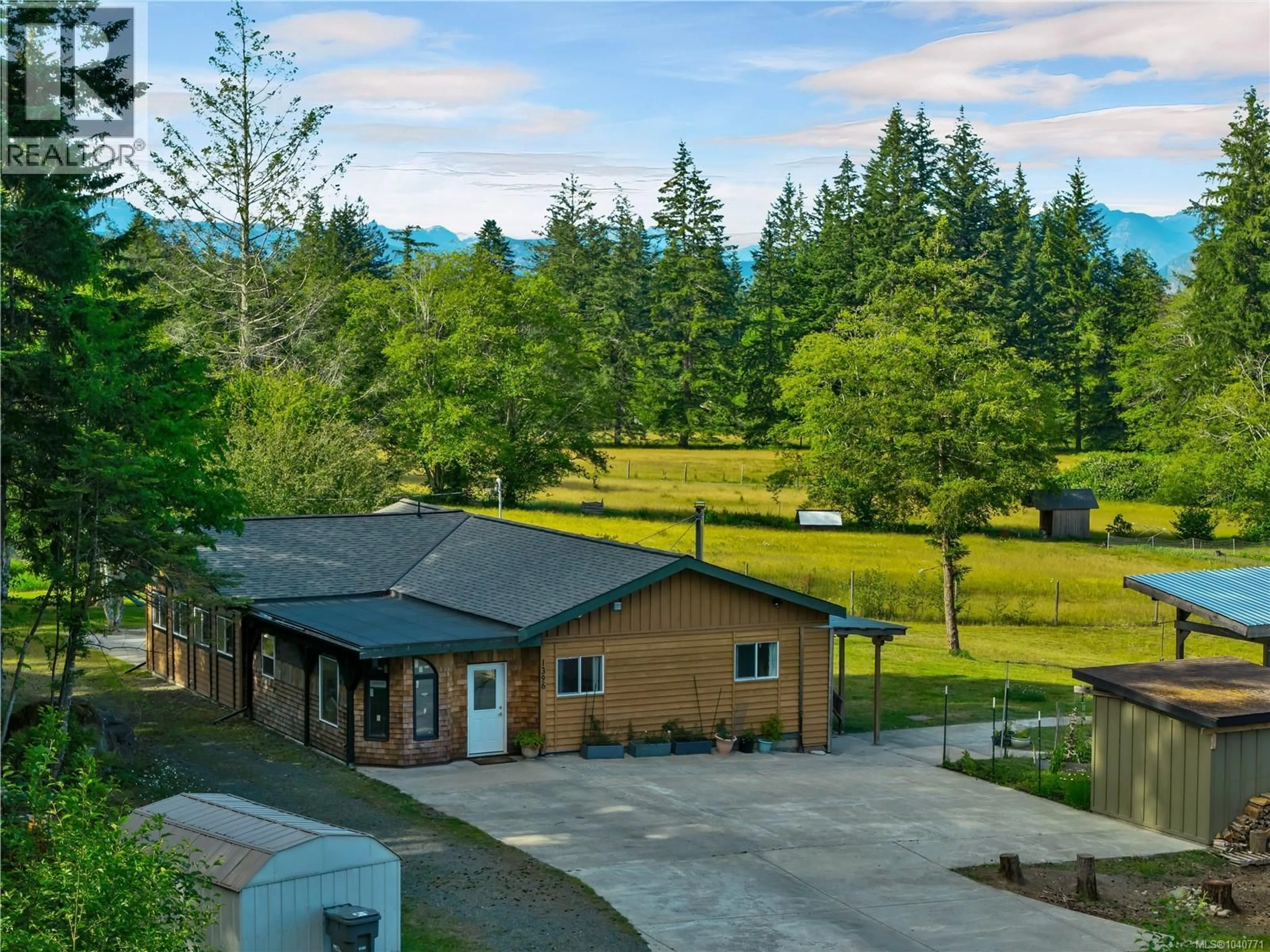 A pic from outside/outdoor area/front of a property/back of a property/a pic from drone, mountain view for 1396 WEST ROAD, Quadra Island British Columbia V0P1H0