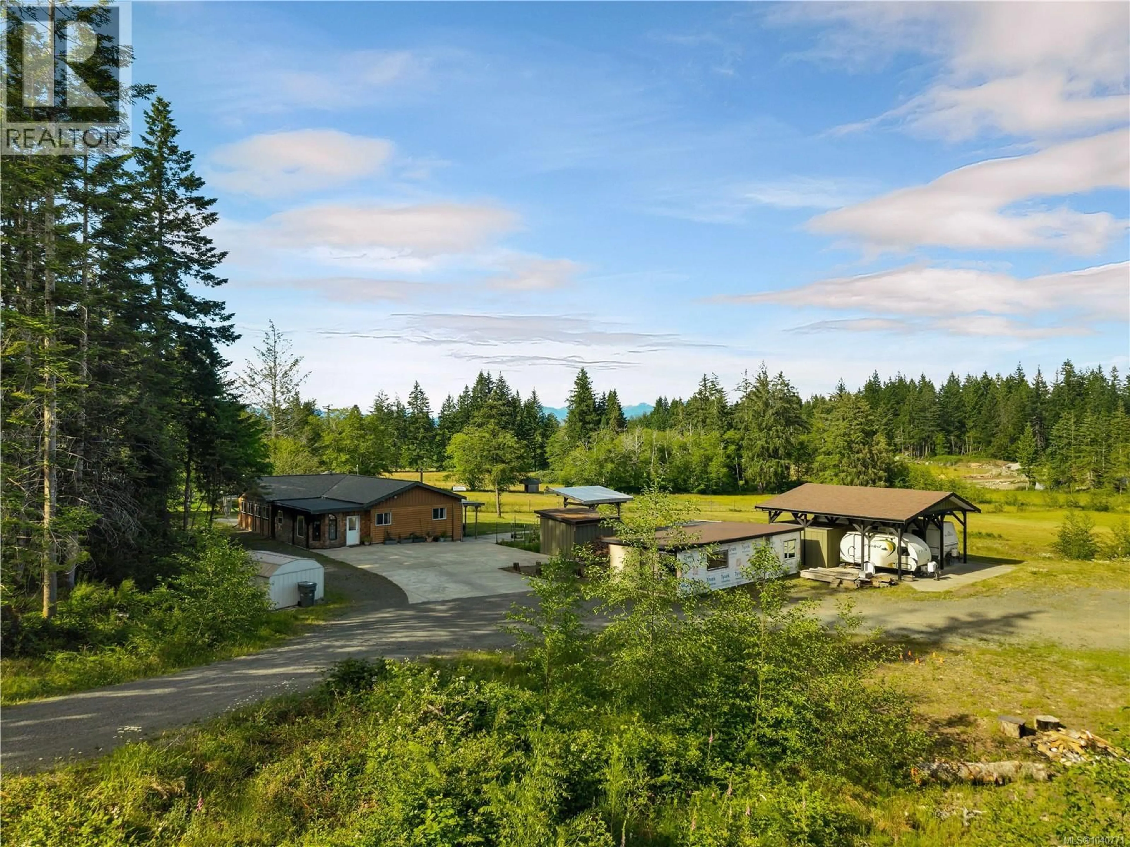 A pic from outside/outdoor area/front of a property/back of a property/a pic from drone, unknown for 1396 WEST ROAD, Quadra Island British Columbia V0P1H0