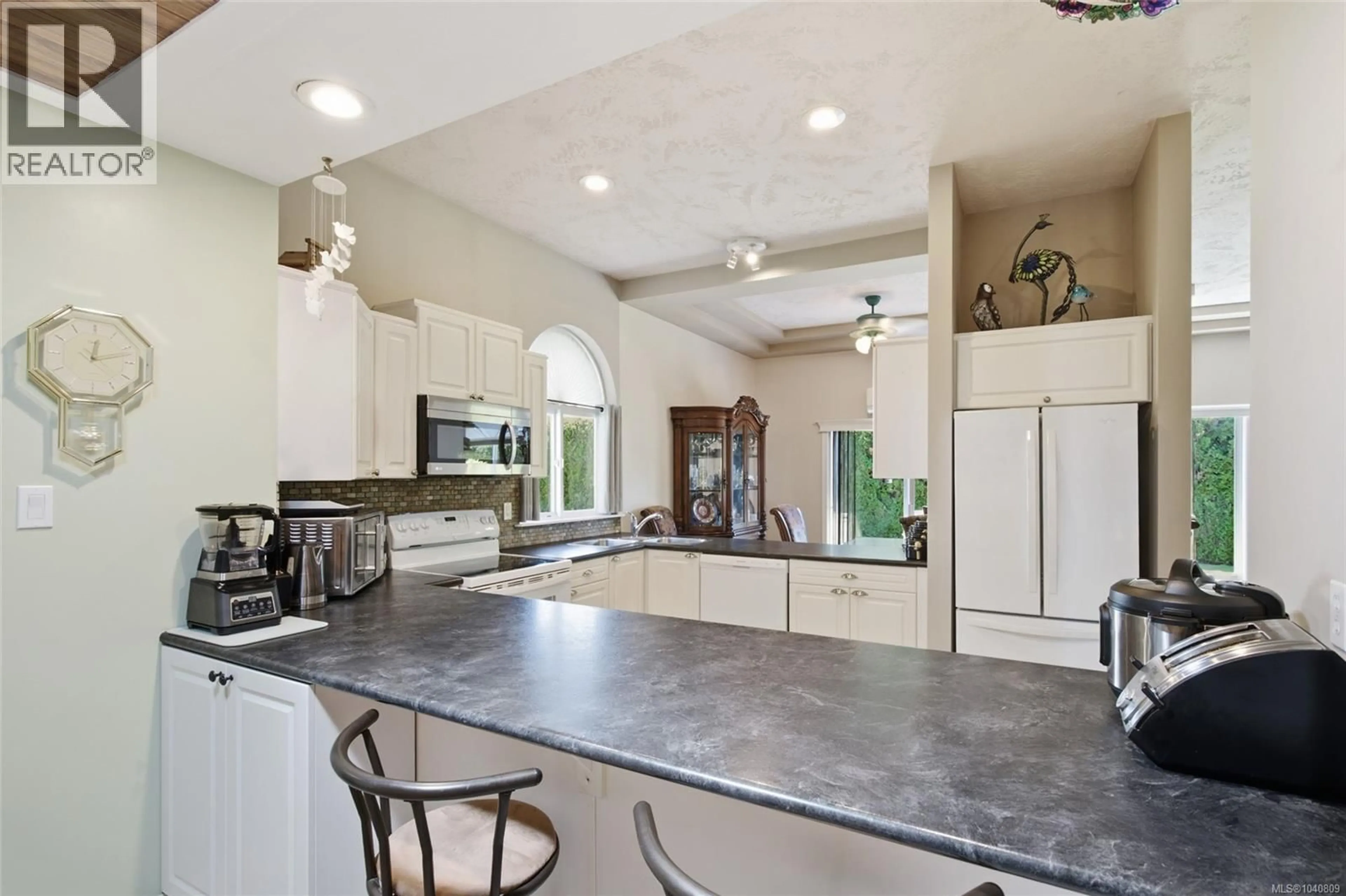 Open concept kitchen, ceramic/tile floor for 30 - 677 BUNTING PLACE, Comox British Columbia V9M3S1