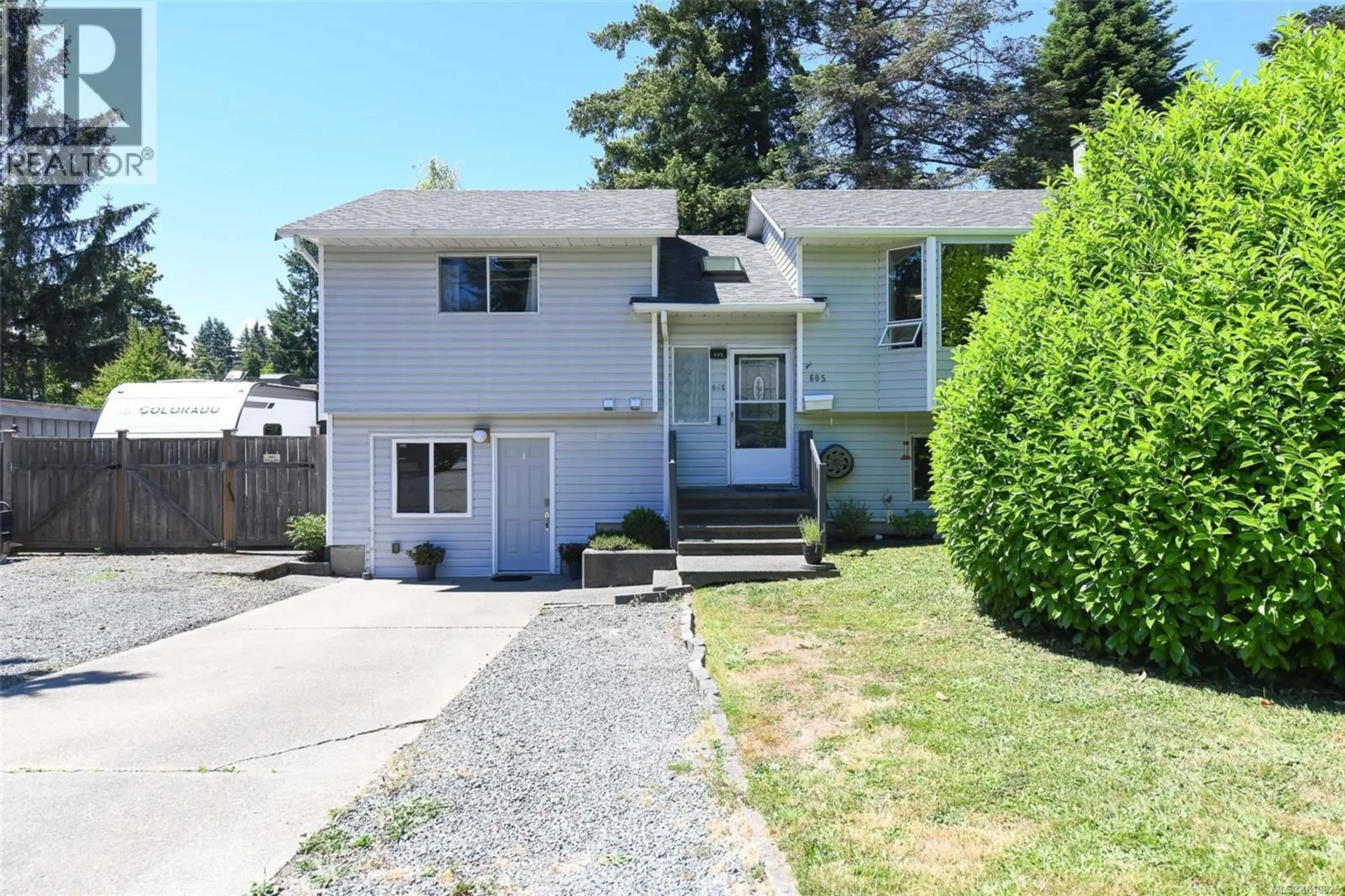Home with vinyl exterior material, street for 605 PRITCHARD ROAD, Comox British Columbia V9M3J1