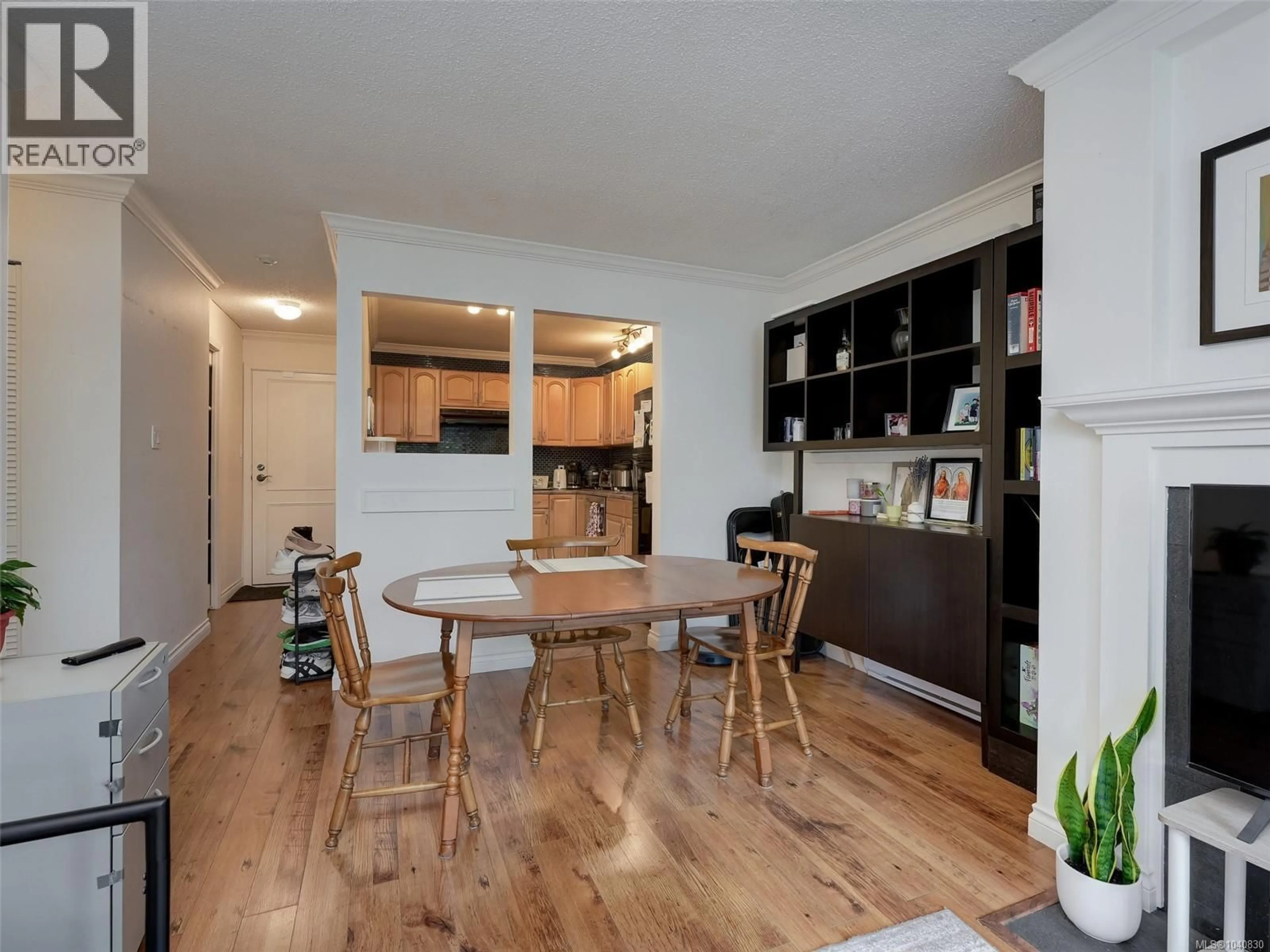 Open concept kitchen, wood/laminate floor for 111 - 3215 ALDER STREET, Saanich British Columbia V8X1P3